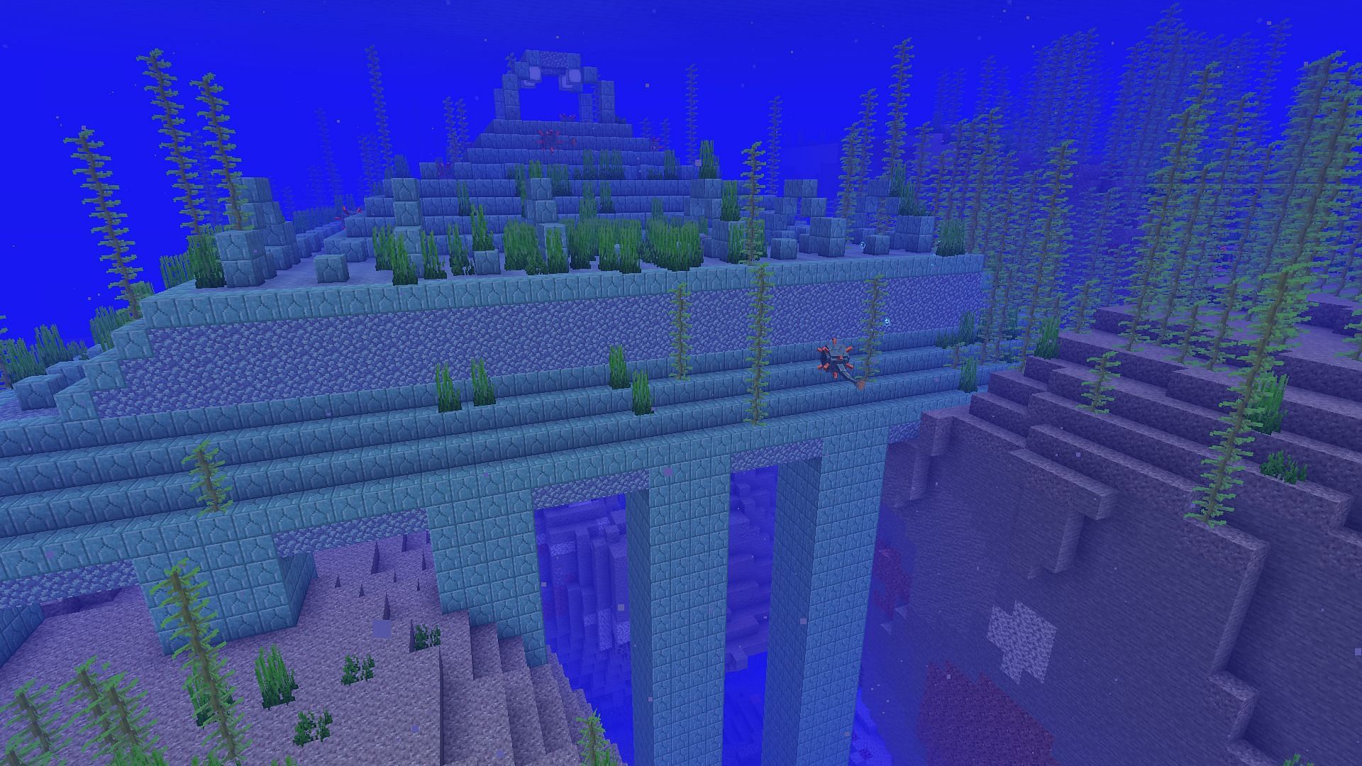 An ocean monument over a ravine (Image via Minecraft)