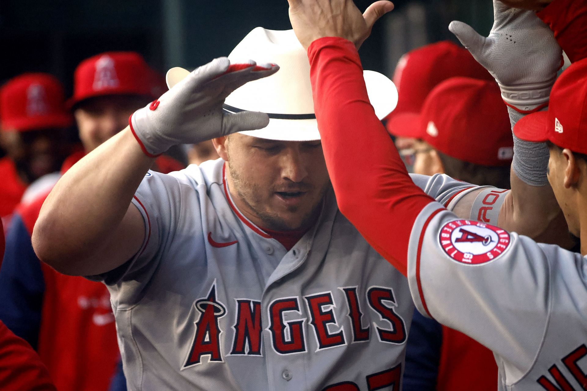 Mike Trout wears a cowboy hat in celebration of his home run against the Texas Rangers.