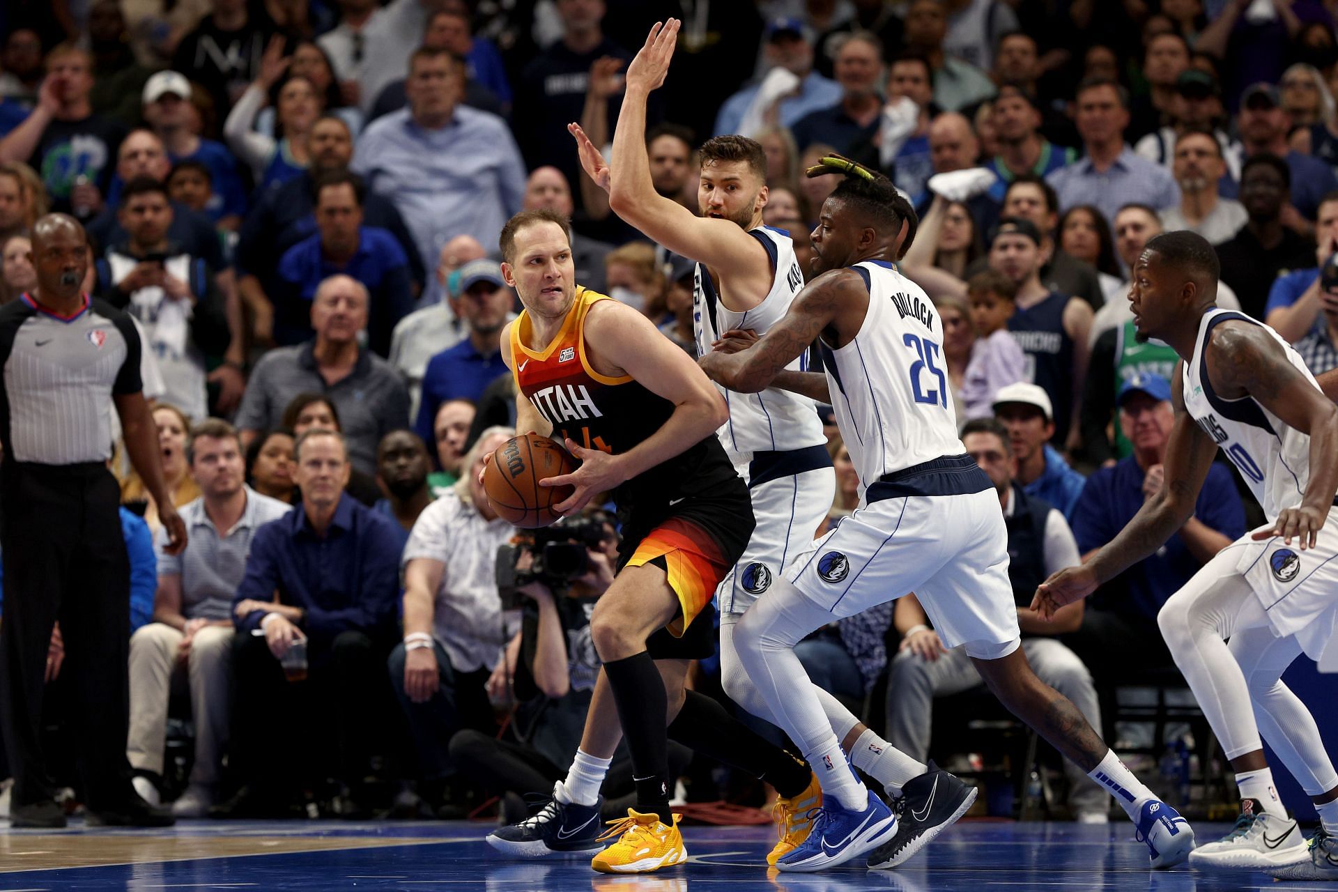 Bojan Bogdanovic attempts to score against a double-team