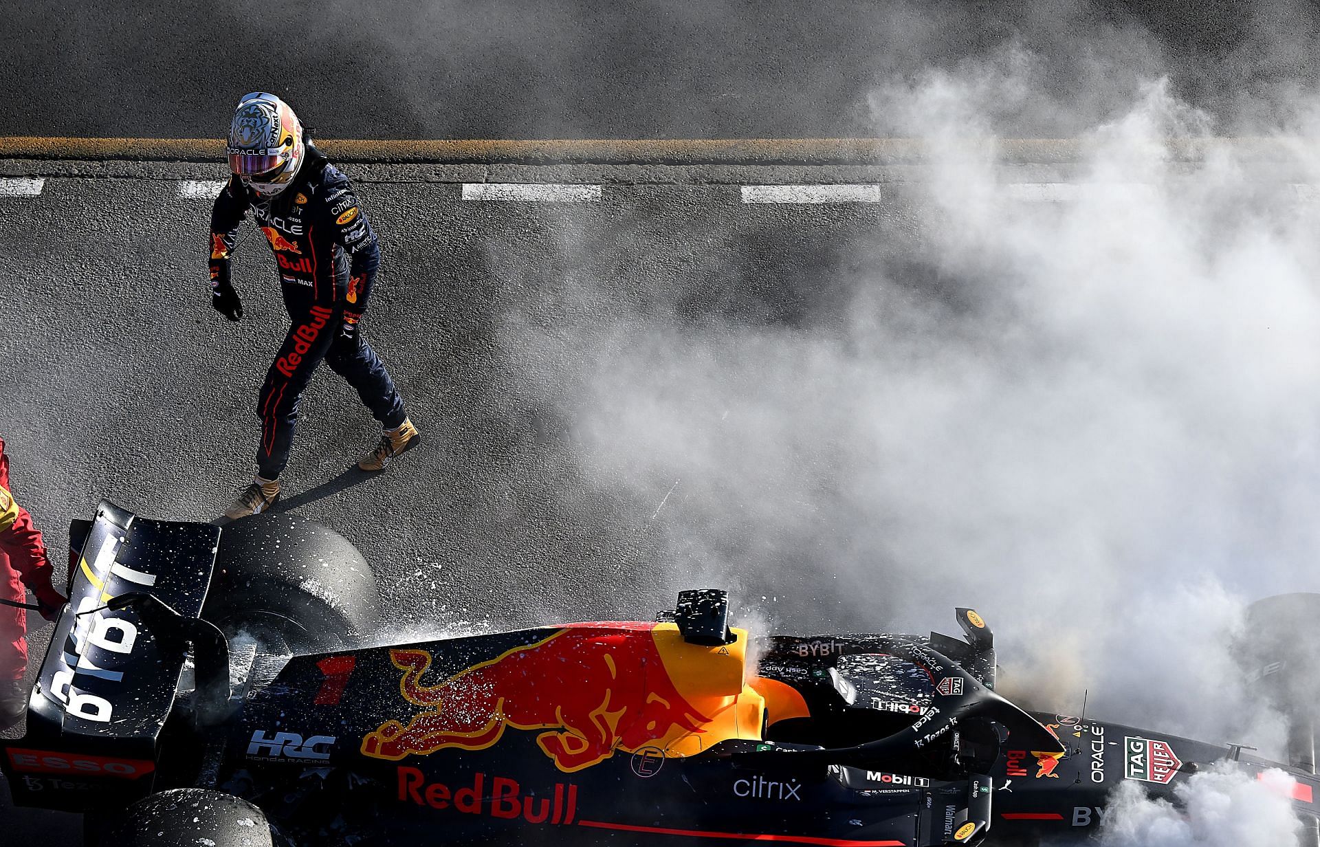 Max Verstappen walks away from his burning RB18 at the 2022 Australian GP