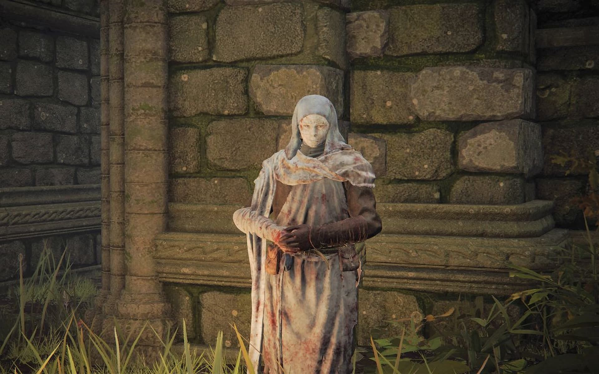 A Tarnished dons the White Mask in Elden Ring (Image via FromSoftware Inc.)