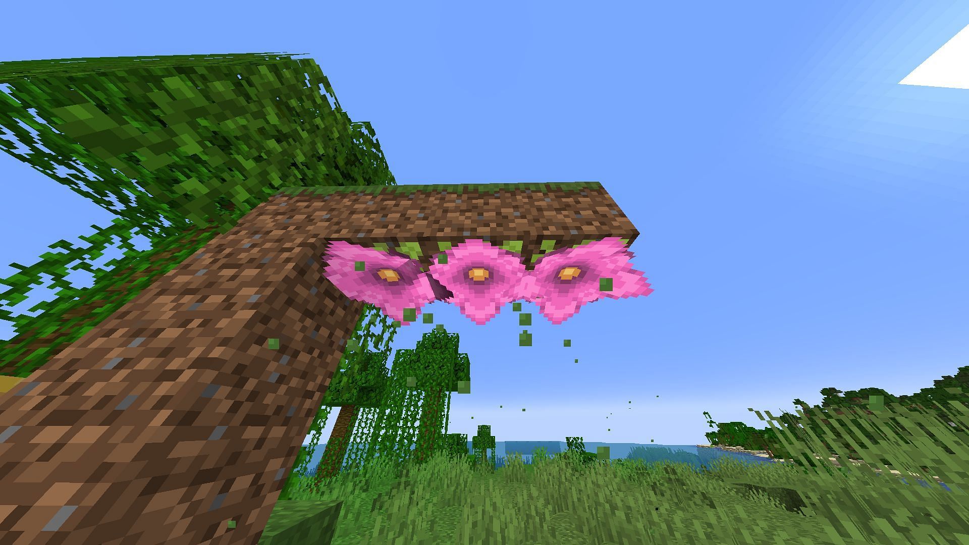Spore Blossoms on dirt blocks on the surface (Image via Minecraft)