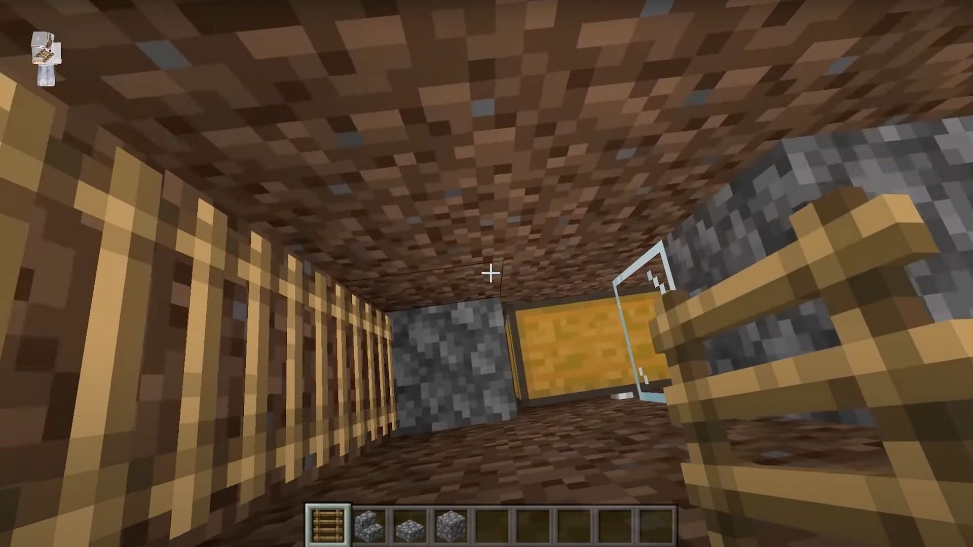 Players should place a cobblestone block next to the chest as well as the ladders (Image via JC Playz/YouTube)