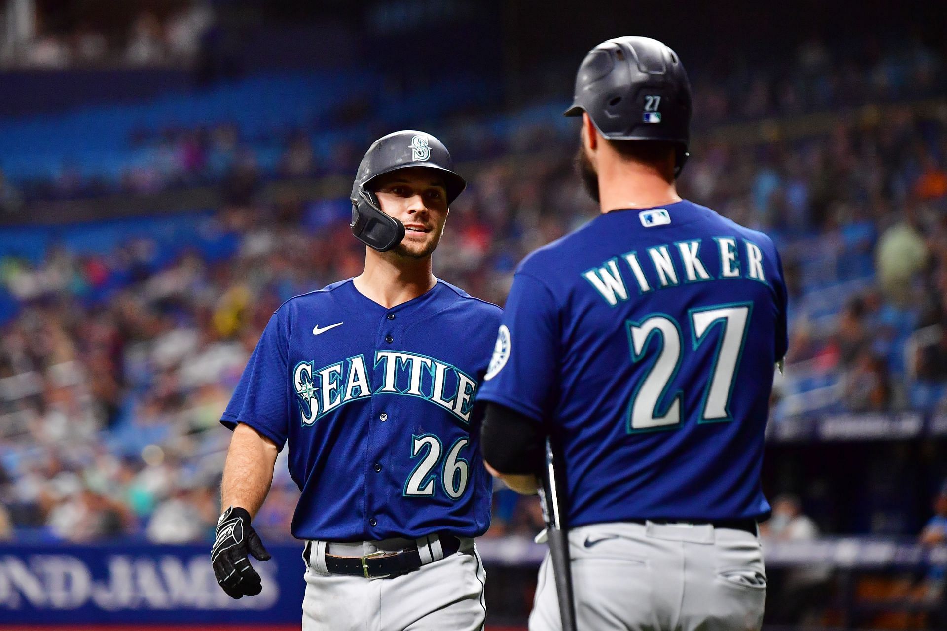 Adam Frazier #26 celebrates with Jesse Winker