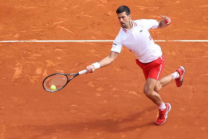 Novak Djokovic practices with players from former coach Riccardo Piatti's tennis center in Monte-Carlo