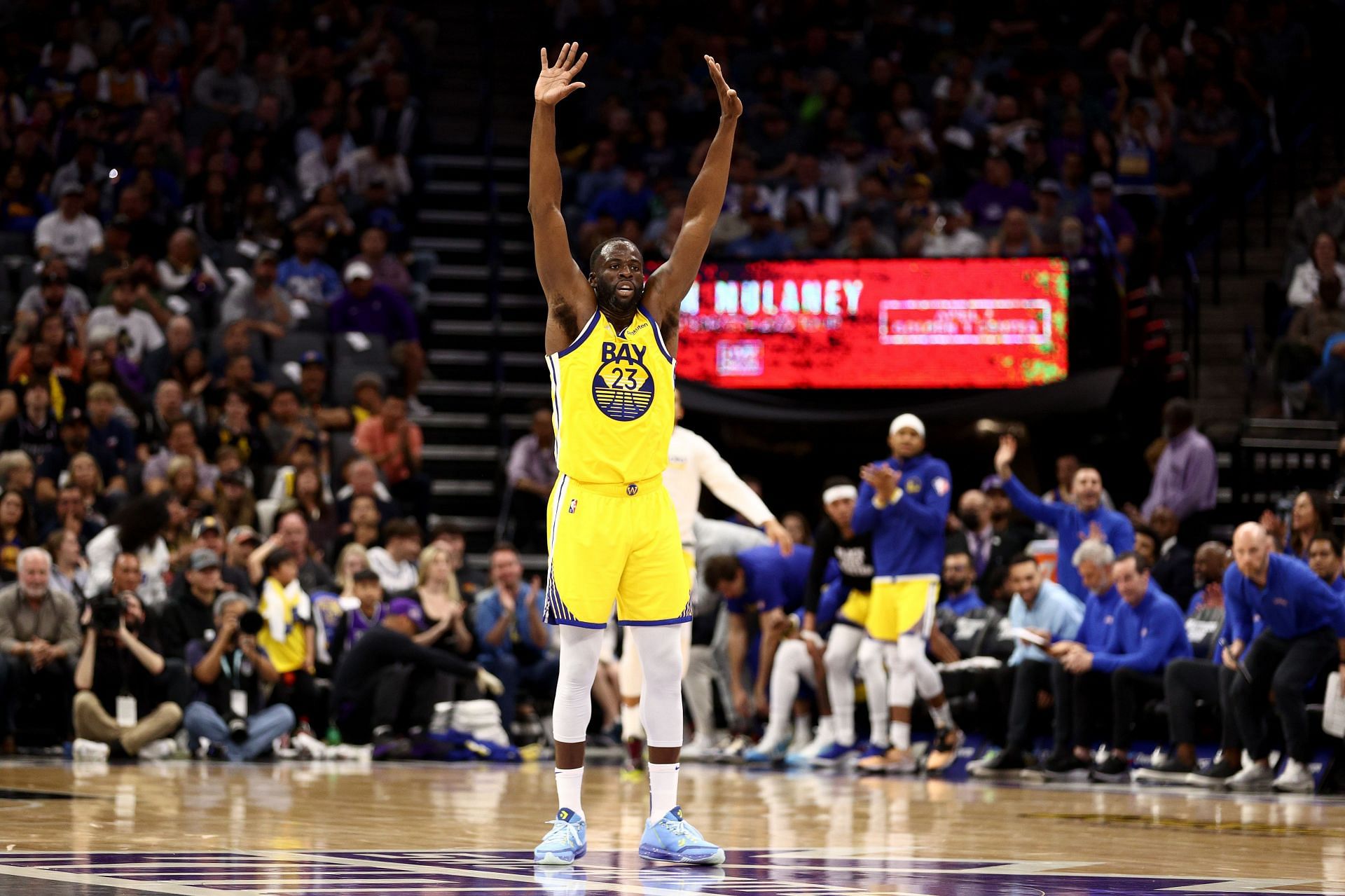 Draymond Green #23 of the Golden State Warriors reacts after the Warriors scored a basket against the Sacramento Kings in the second half at Golden 1 Center on April 03, 2022 in Sacramento, California.