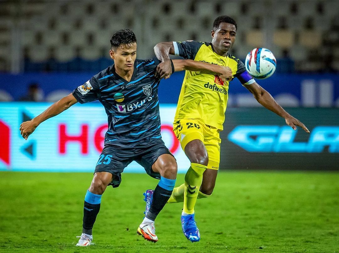 Kerala Blasters FC midfielder Jeakson Singh in action against Hyderabad FC&#039;s Bartholomew Ogbeche in the ISL 2021-22 Final (Image Courtesy: Kerala Blasters FC Instagram)