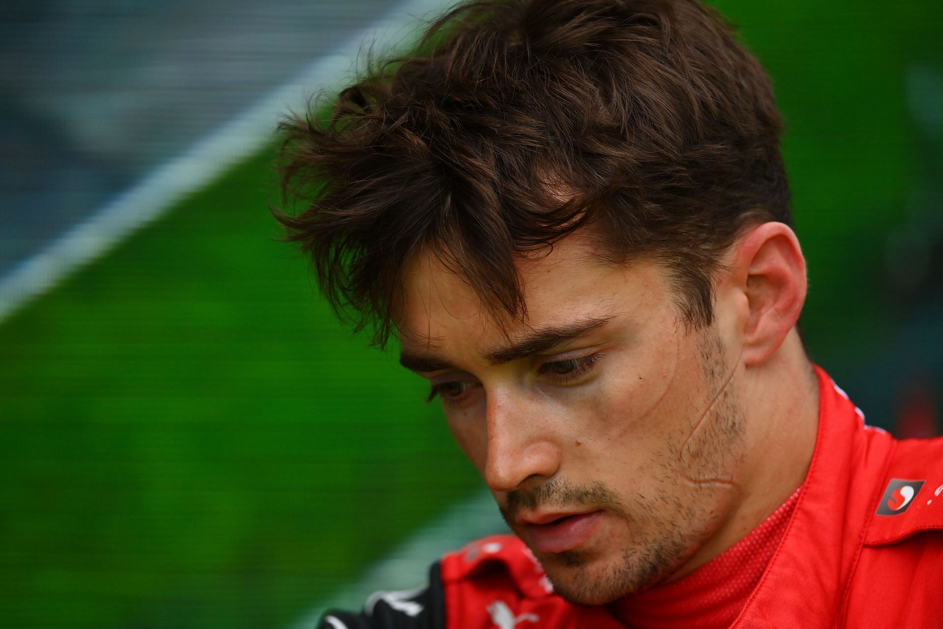 Sixth-placed Charles Leclerc of Monaco and Ferrari looks dejected in parc ferme after spinning out from third position with 10 laps remaining during the F1 Grand Prix of Emilia Romagna at Autodromo Enzo e Dino Ferrari on April 24, 2022 (Photo by Dan Mullan/Getty Images)