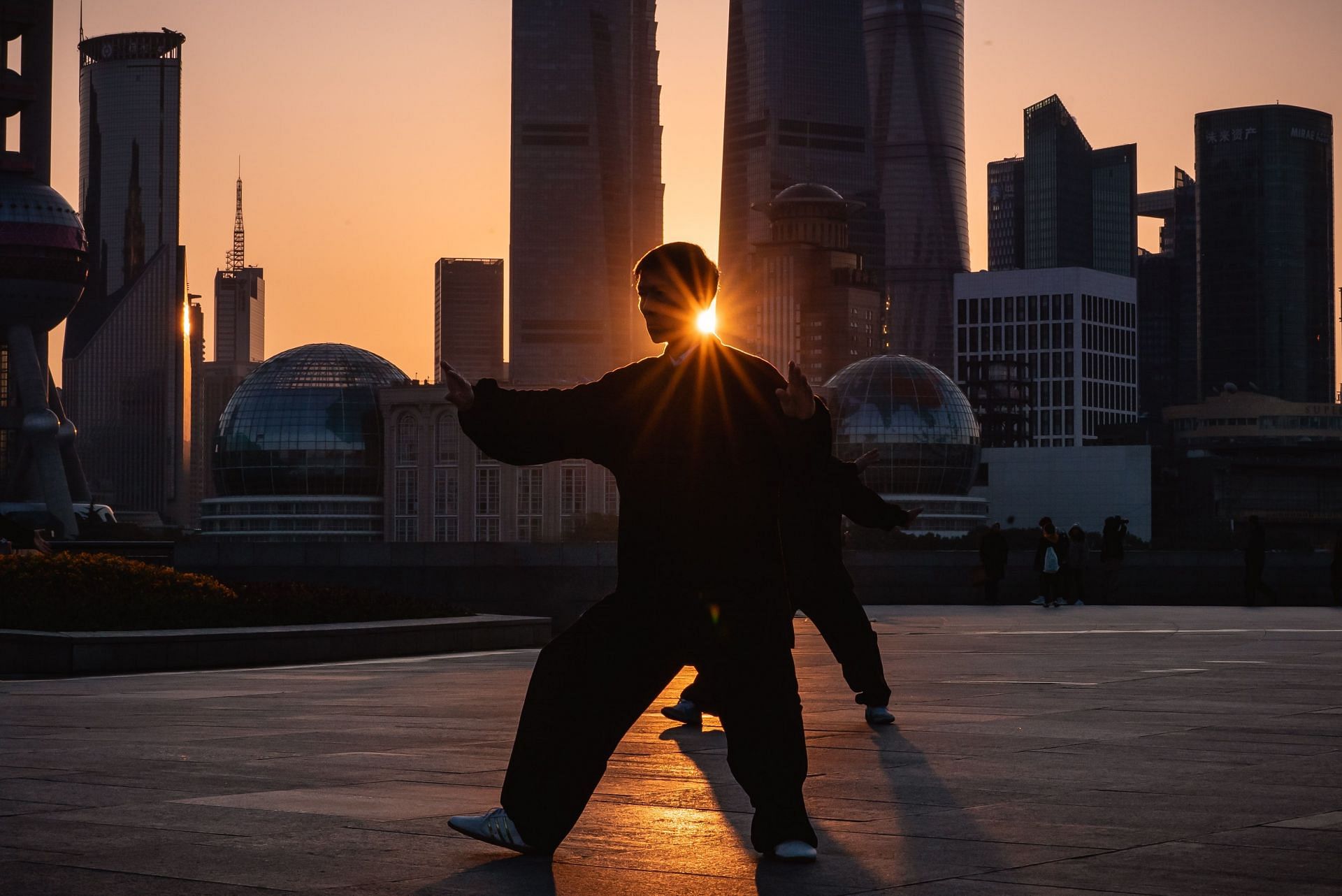 Tai chi helps you to reduce stress &amp; relax your mind. (Image by Kevin Olson / Unsplash)