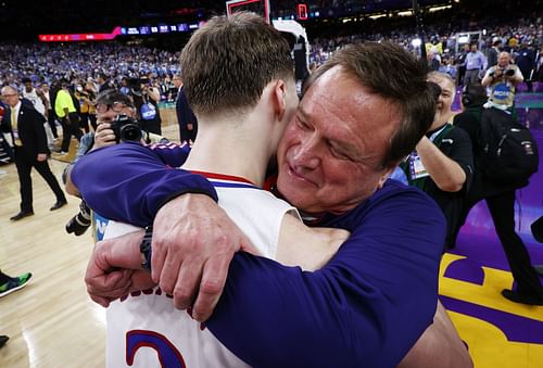 Kansas Jayhawks coach Bill Self and junior Chirstian Braun after defeating North Carolina