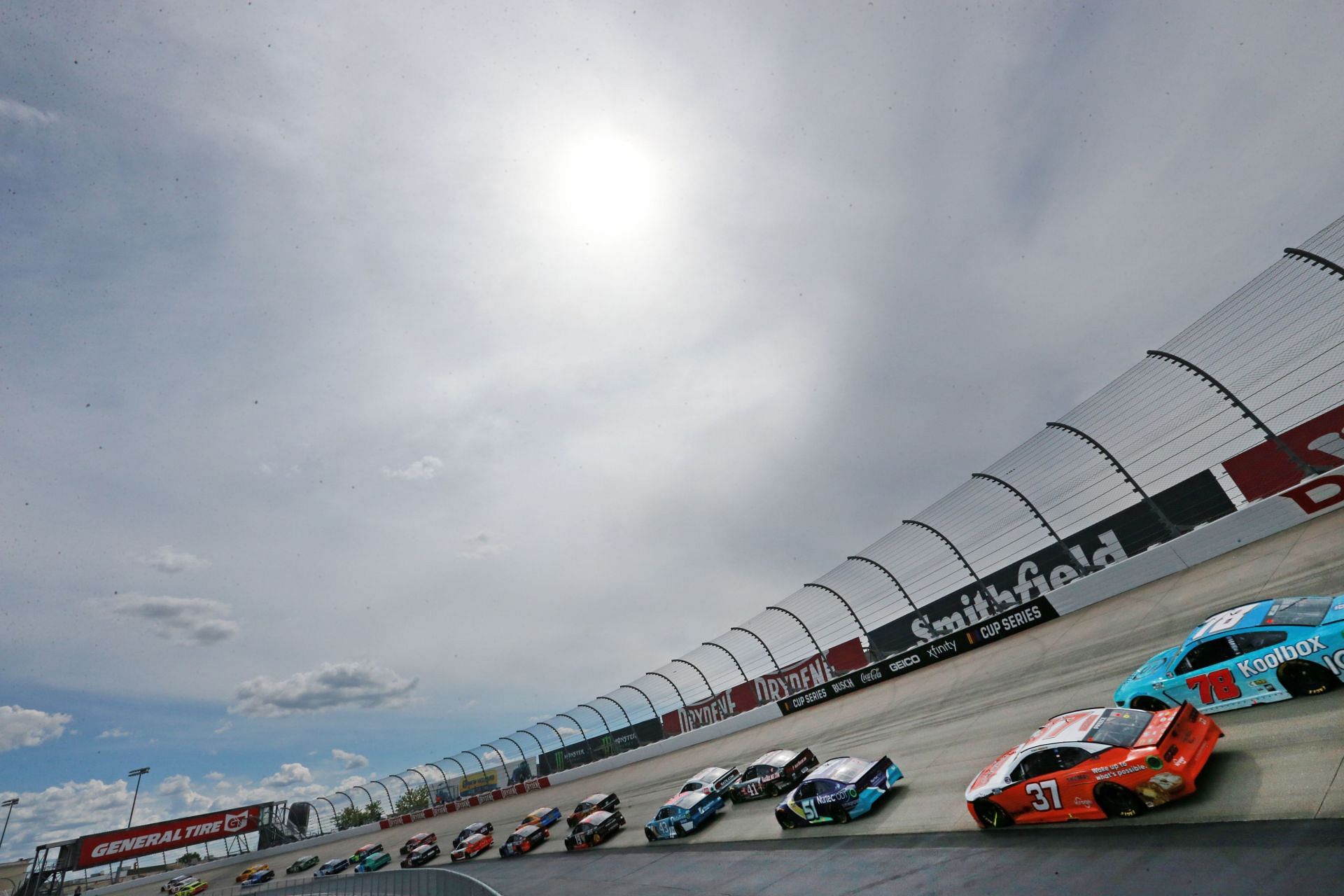 Cars race during the 2021 NASCAR Cup Series Drydene 400 at Dover Motor Speedway in Dover, Delaware. (Photo by Sean Gardner/Getty Images)