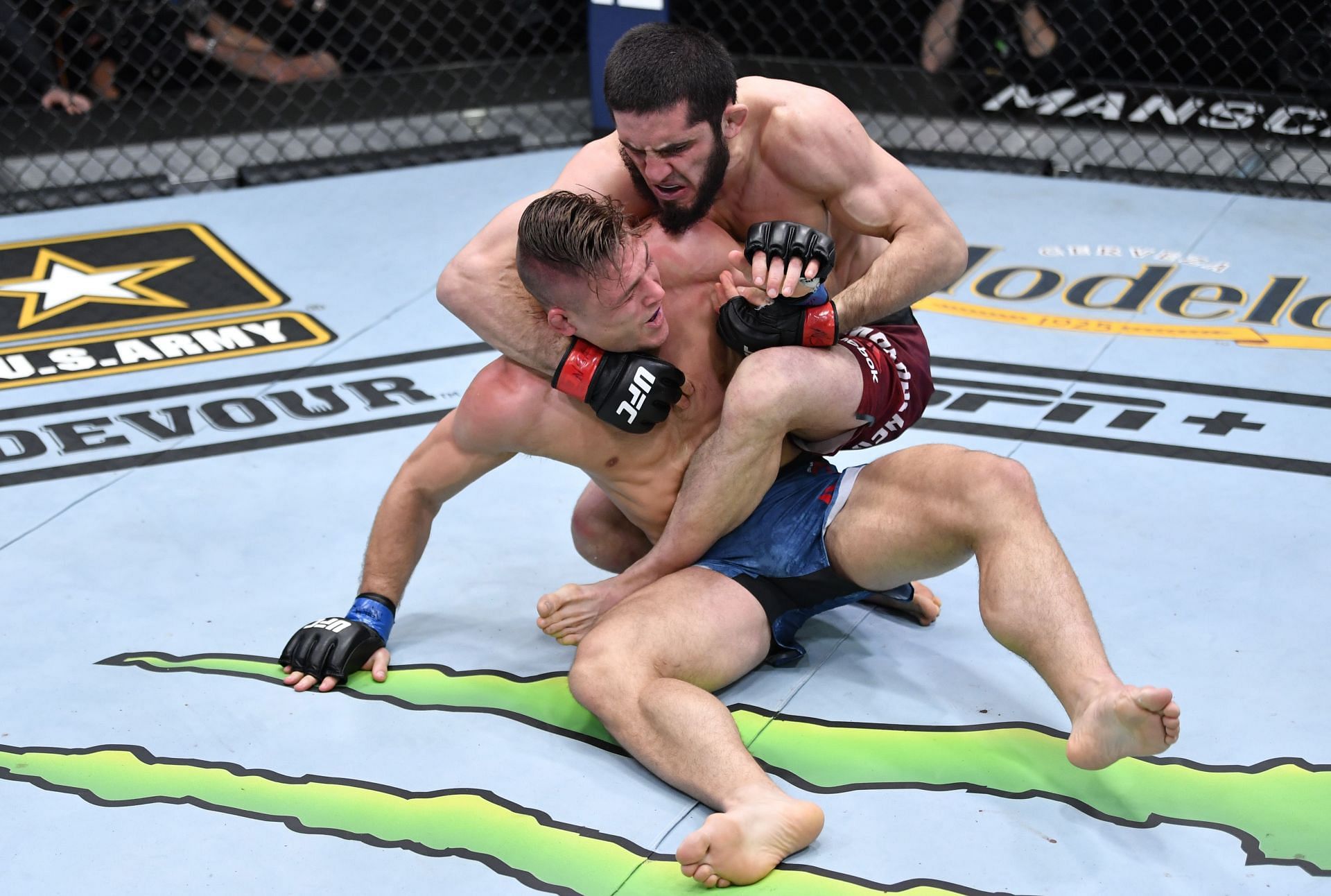 Islam Makhachev in action against Drew Dober at UFC 259