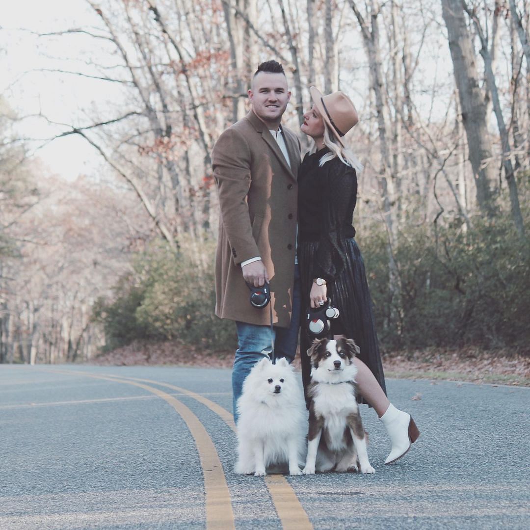 Mike Trout &amp; Jessica Cox poses for an IG post with their Dogs.