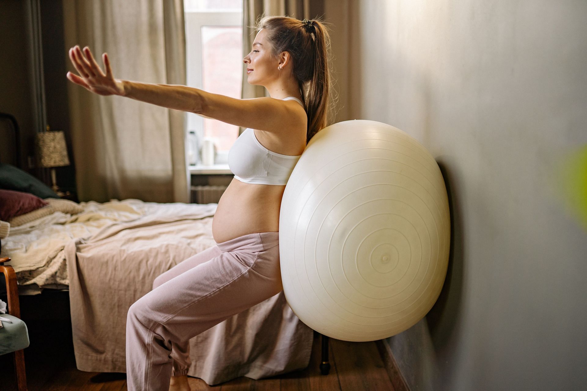 Best prenatal exercises for lower back pain. (Image via Pexels/ Yan Krukov)
