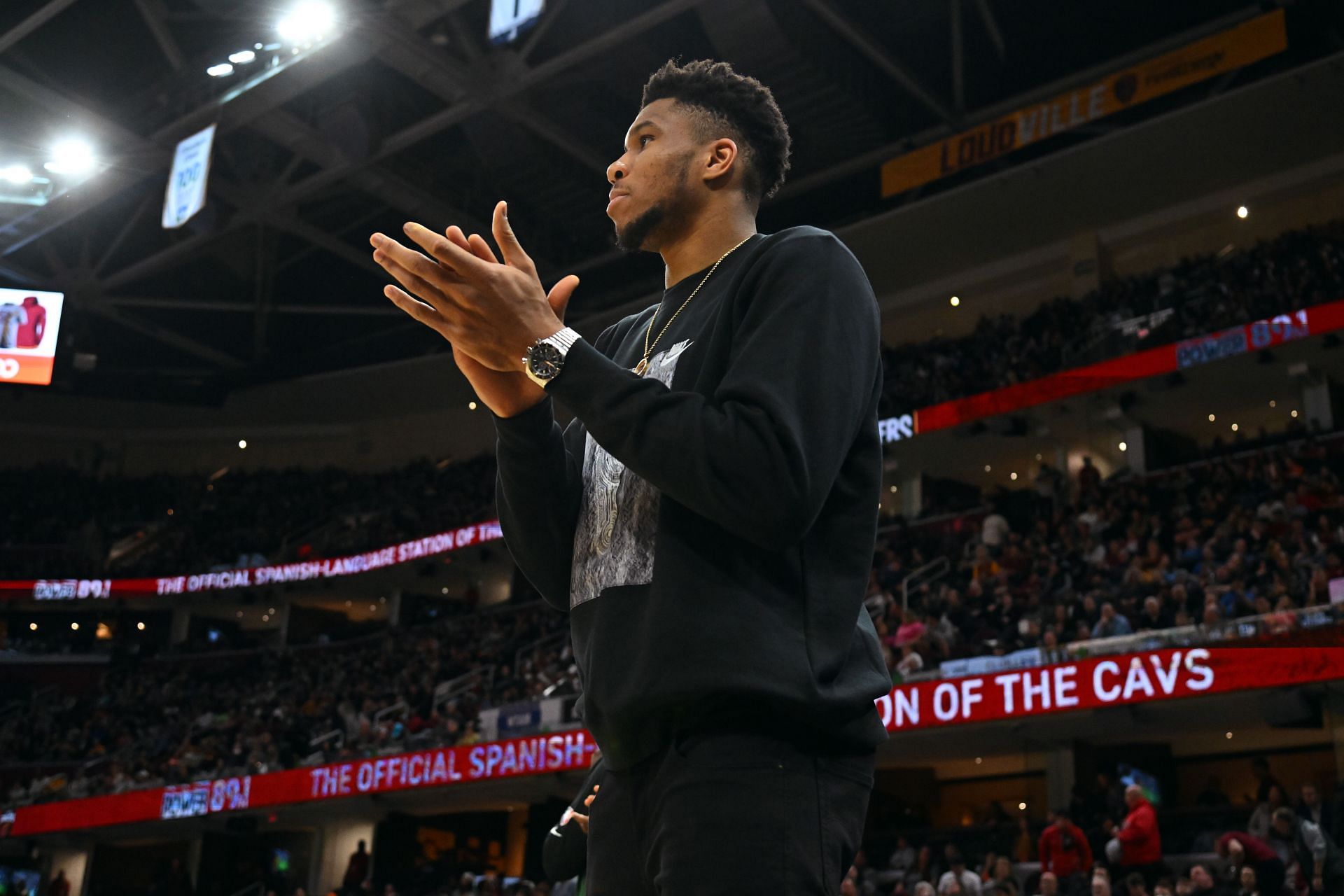 Giannis Antetokounmpo of the Milwaukee Bucks watches from the bench against the Cleveland Cavaliers on April 10 in Cleveland, Ohio. The Cavaliers defeated the Bucks 133-115