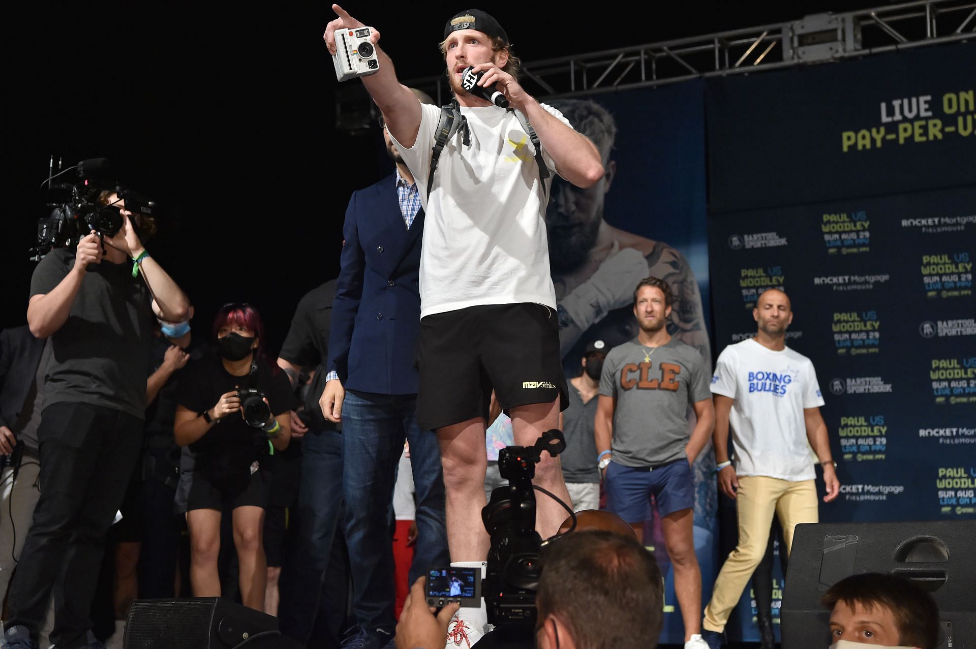 Logan Paul onstage at the Jake Paul v Tyron Woodley weigh In