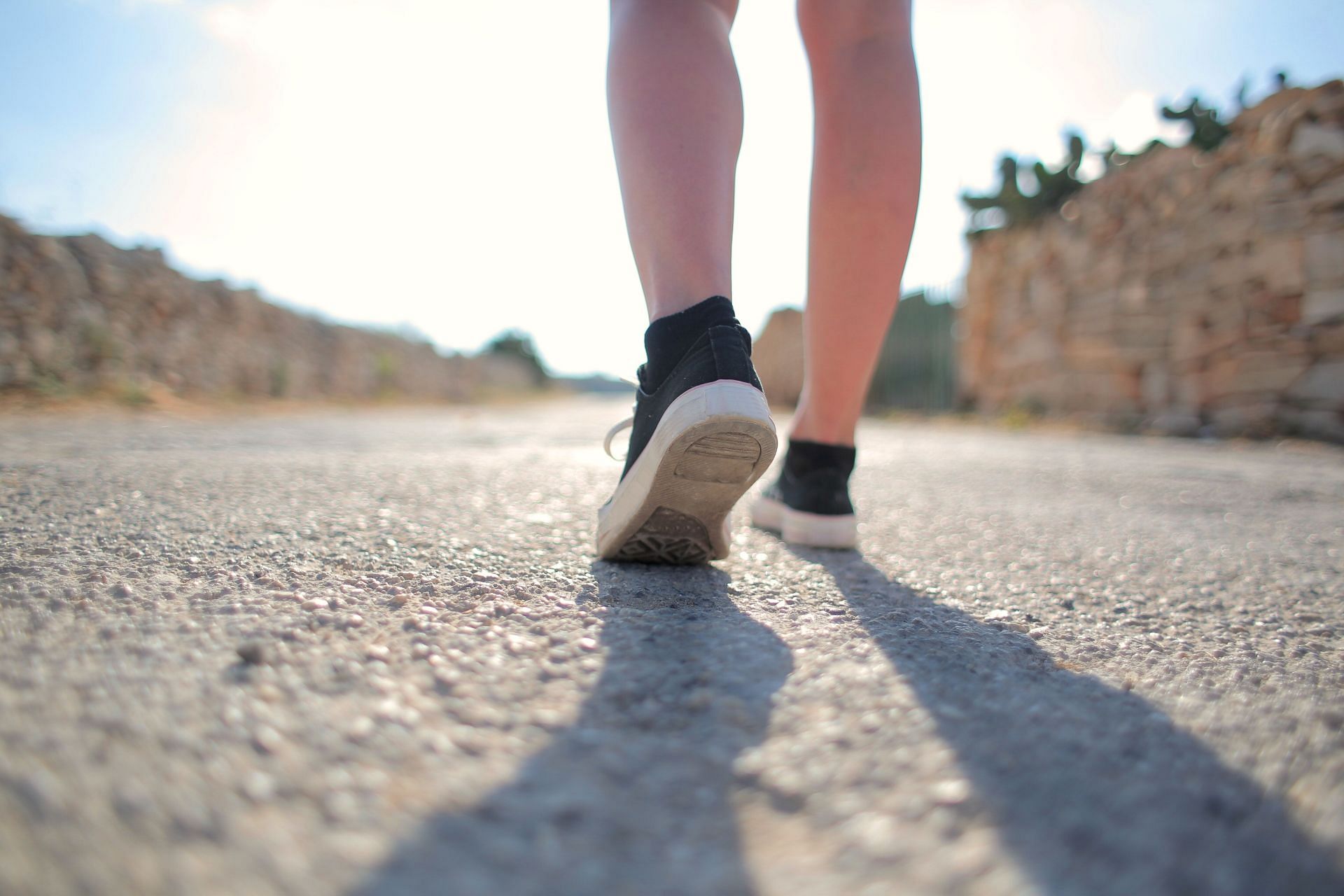 You burn more calories when you walk outside. (Image by Andrea Piacquadio / Pexels)