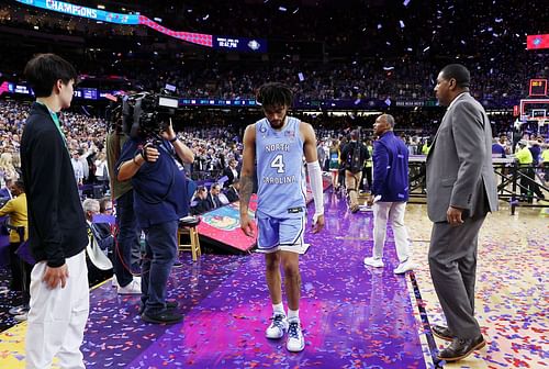 RJ Davis walks off the court after North Carolina's loss to the Kansas Jayhawks.