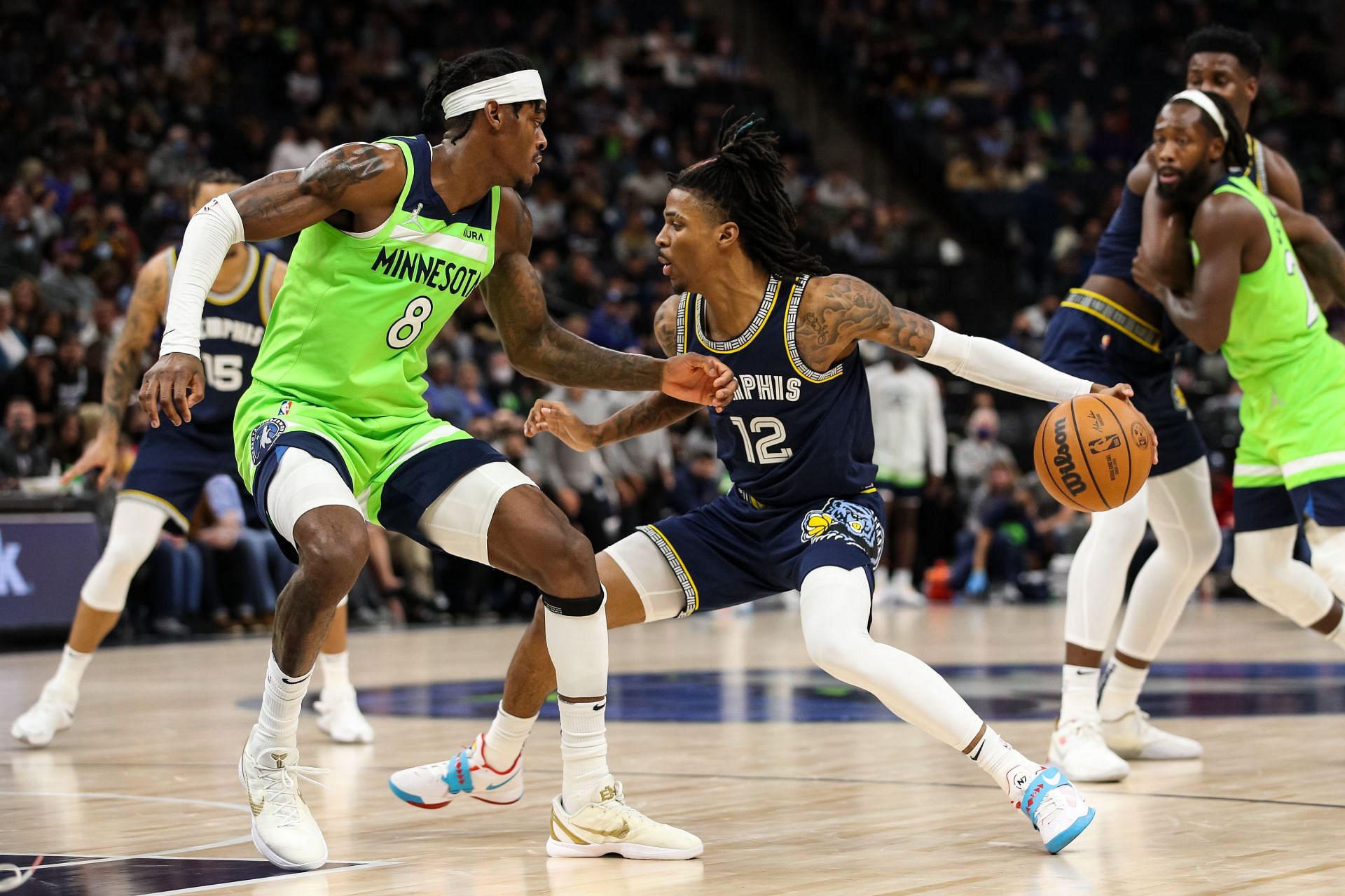 Ja Morant (#12) of the Memphis Grizzlies in action vs the Minnesota Timberwolves