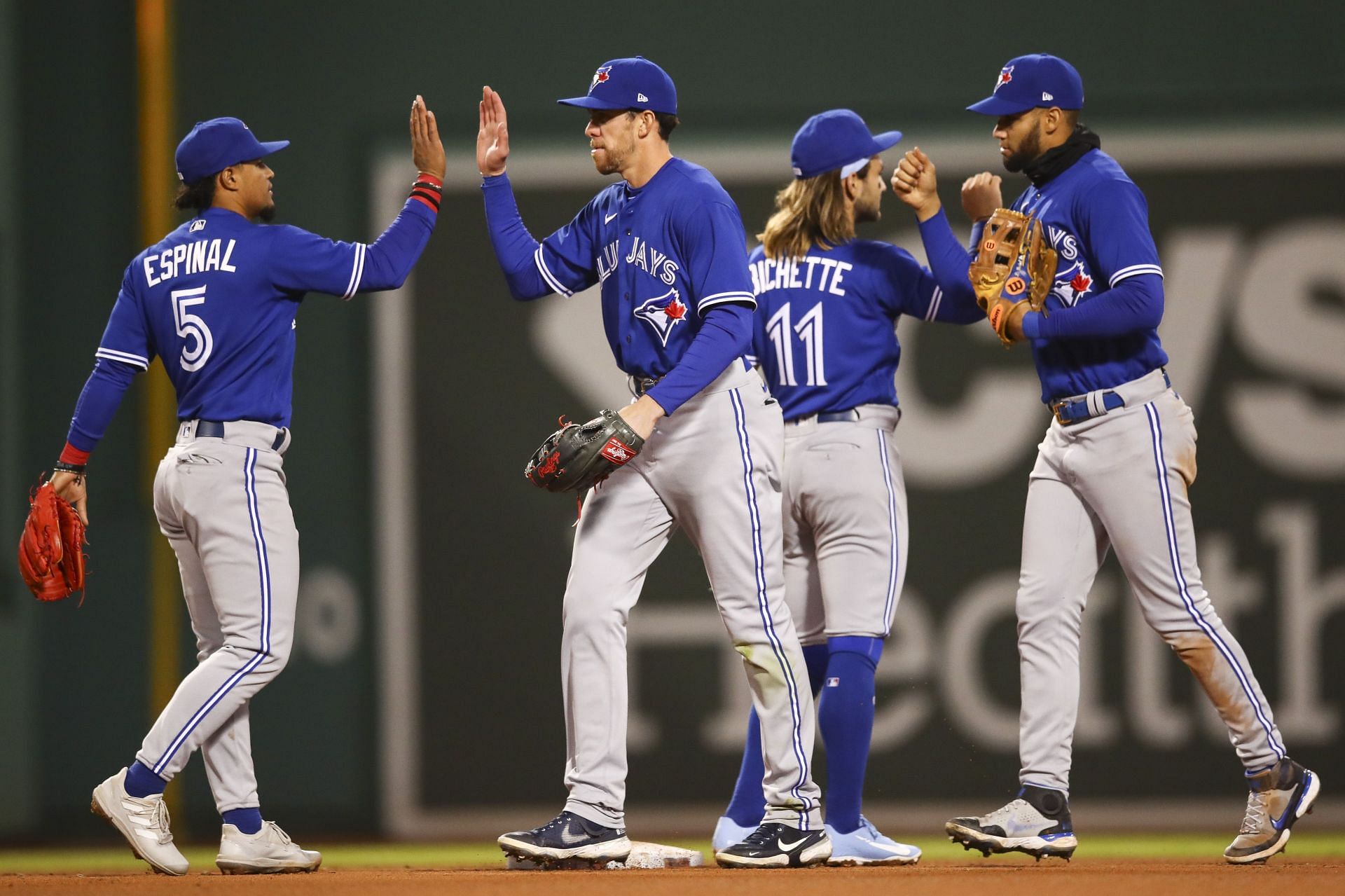 The Toronto Blue Jays celebrate a win against the Boston Red Sox