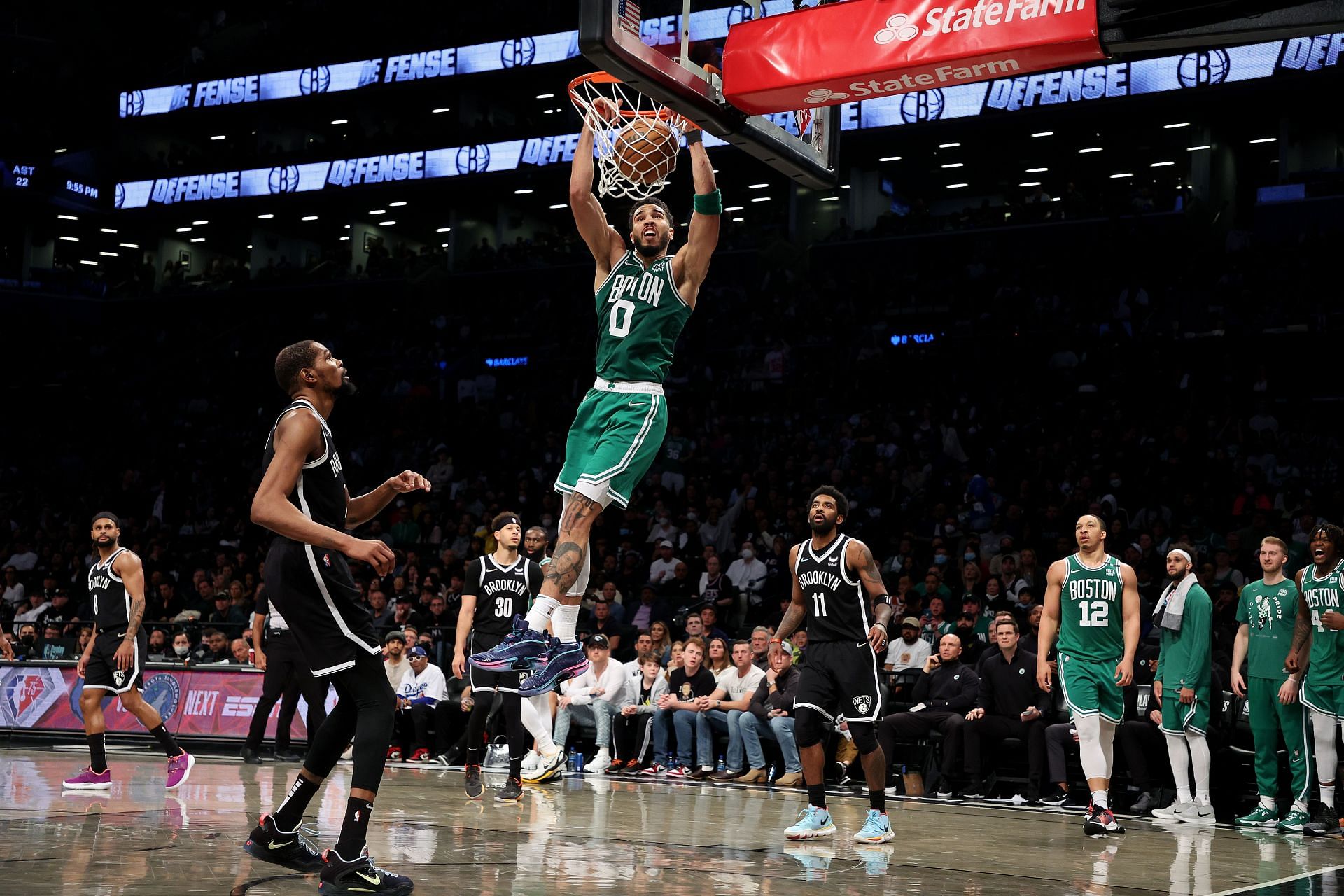The Boston Celtics&#039; Jayson Tatum seen throwing it down against Brooklyn Nets star Kevin Durant in Game Three