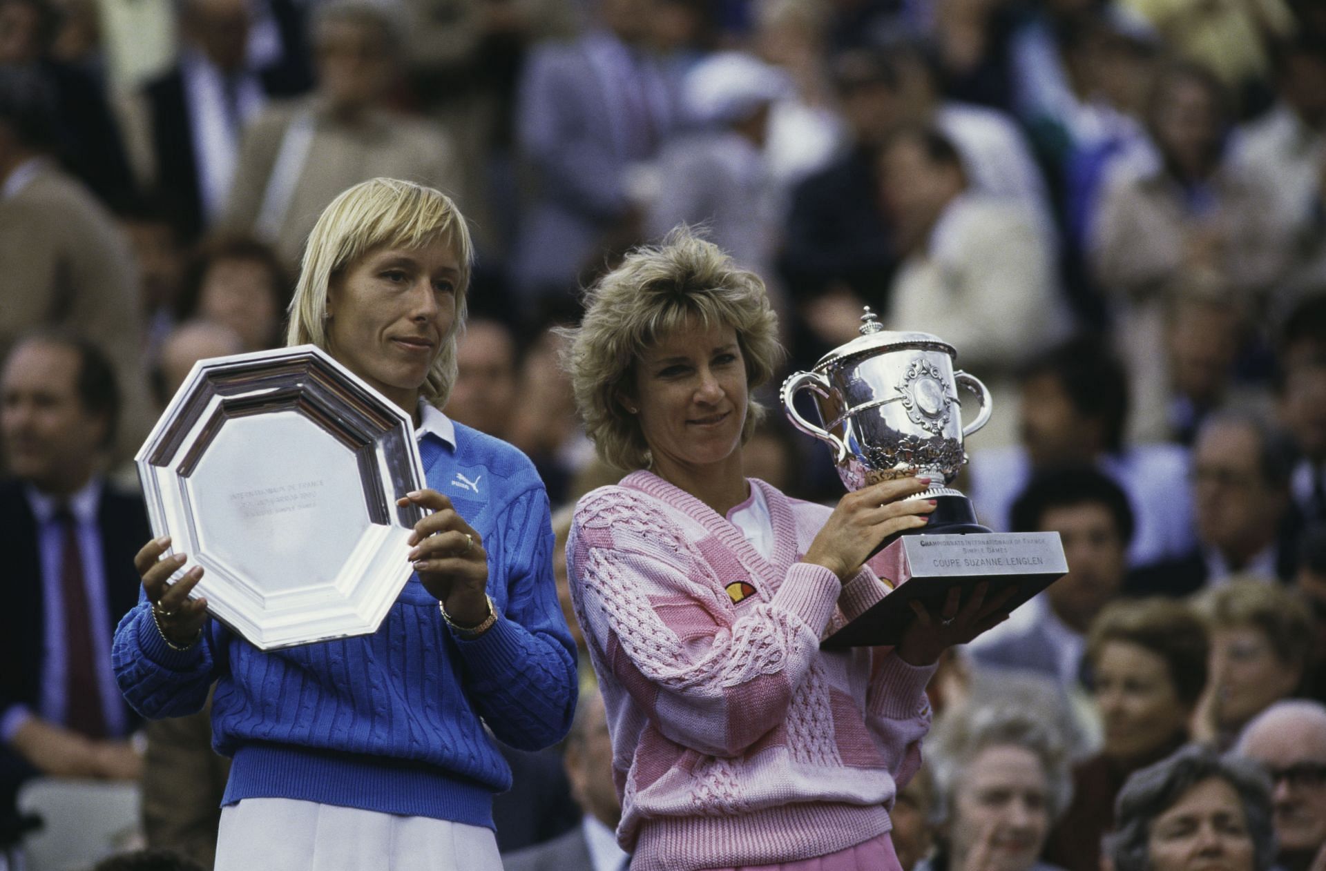 Chris Evert (right) hoists her trophy in Roland Garros in 1986, her last in the tournament and the final Major title of her career. She beat great rival Martina Navratilova (left), 2-6, 6-3, 6-3, in the final.