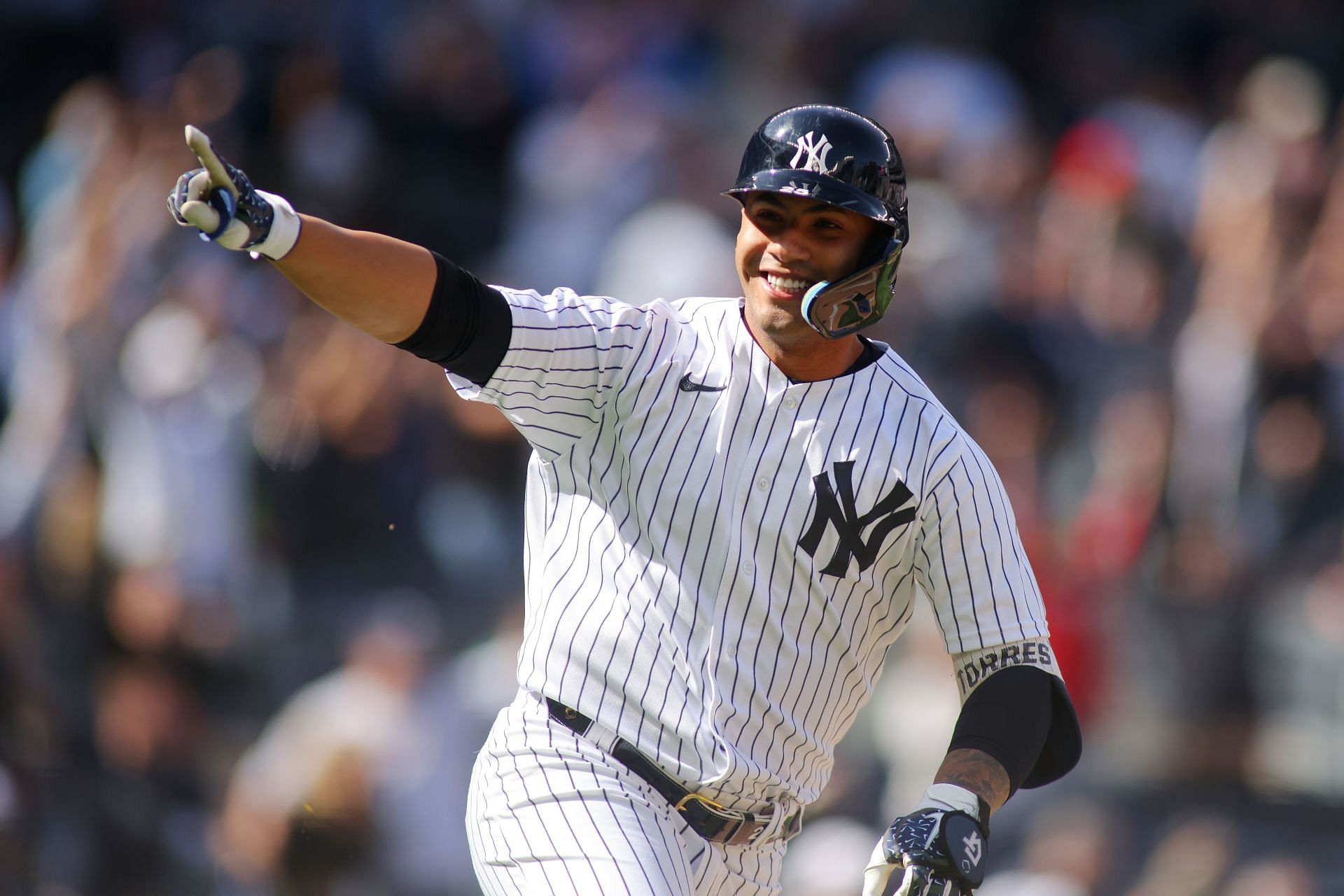 Gleyber Torres #25 of the New York Yankees celebrates his walk-off RBI single