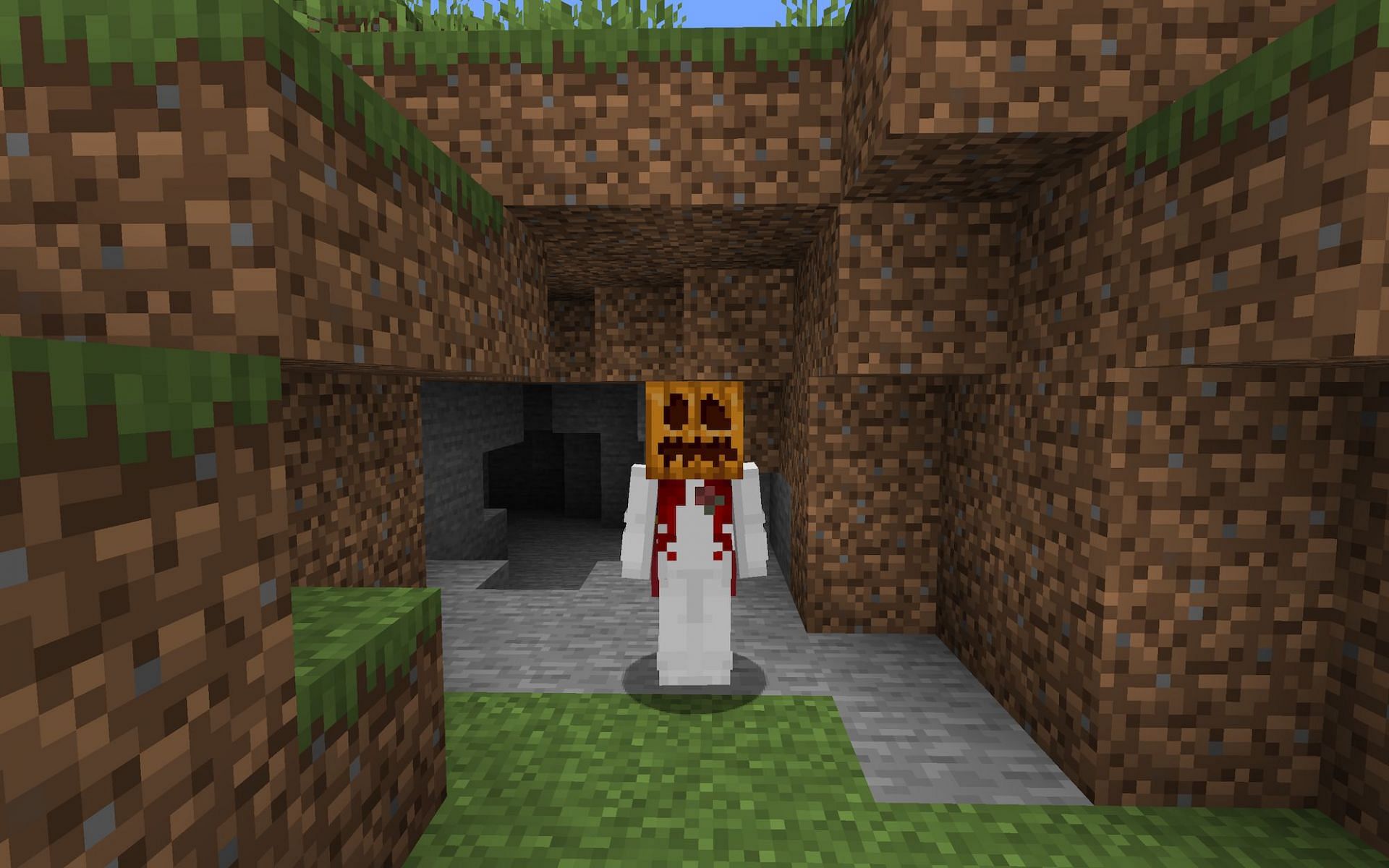 A player with a carved pumpkin on their head [Image via Minecraft[