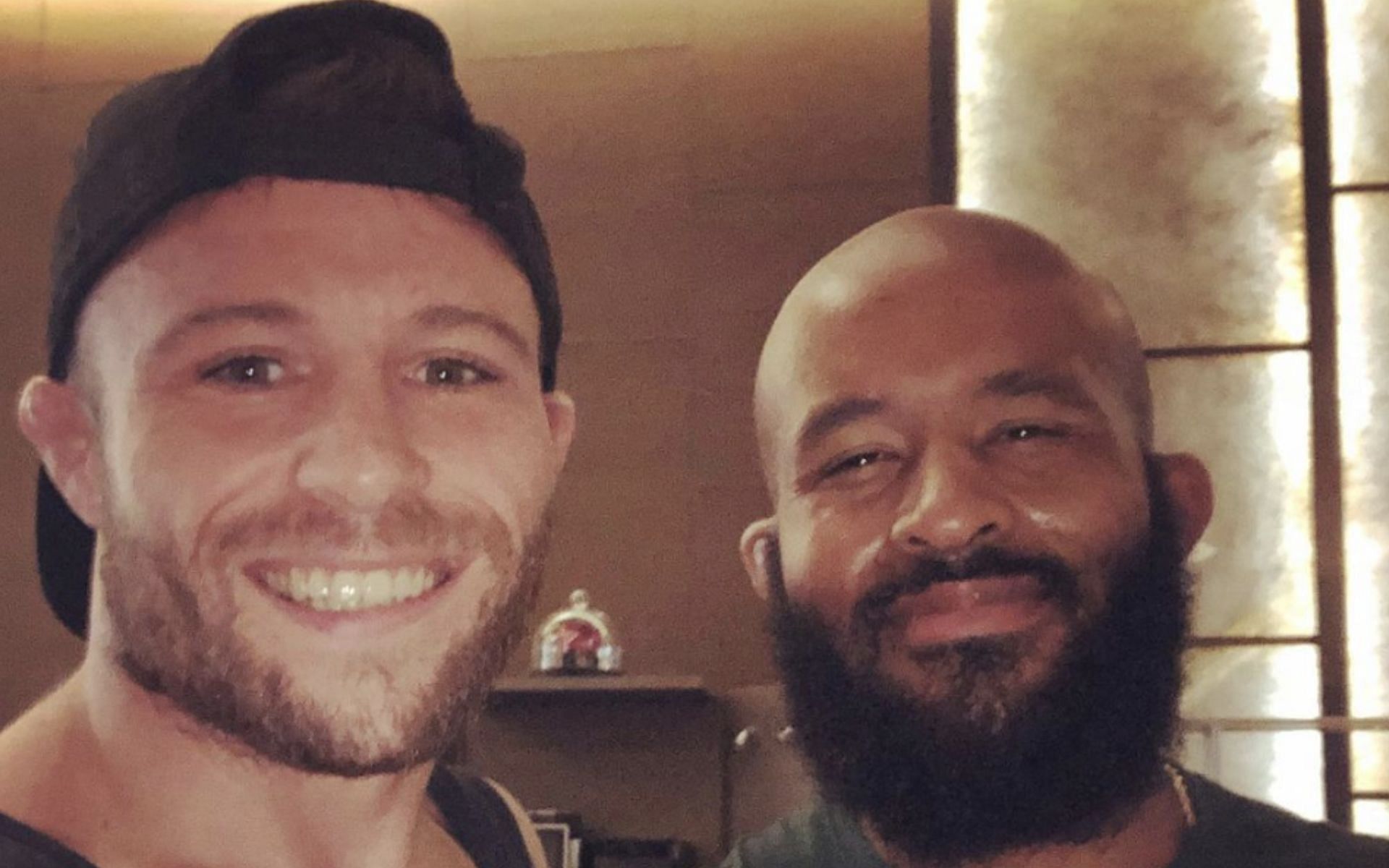 Jarred Brooks (left) bumps into his fighting inspiration Demetrious Johnson (right) in the fighters&#039; hotel ahead of ONE: Eersel vs. Sadikovic. [Photo Jarred Brooks Instagram]
