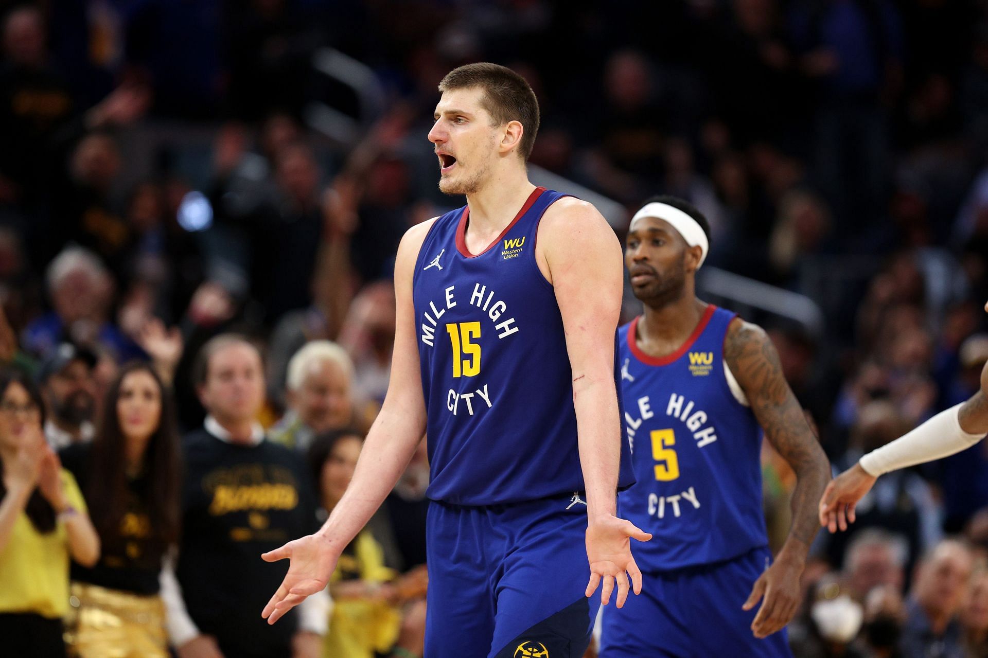 Nikola Jokic No. 15 of the Denver Nuggets complains after his second technical foul against the Golden State Warriors in the second half during Game 2 of the Western Conference First Round.