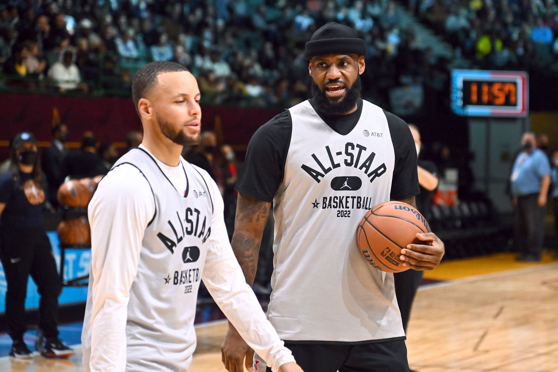 LeBron James, right, talks with Stephen Curry during 2022 NBA All-Star Practice