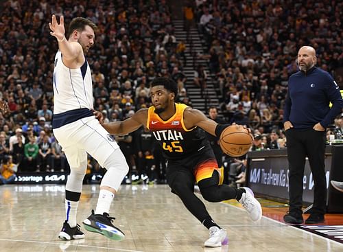 Dallas Mavericks vs. Utah Jazz, Game 6: Donovan Mitchell drives under Luka Doncic.