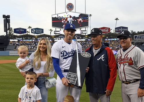 Los Angeles Dodgers first baseman Freddie Freeman collects his 2021 Silver Slugger Award ahead of his game against the Atlanta Braves, his former team