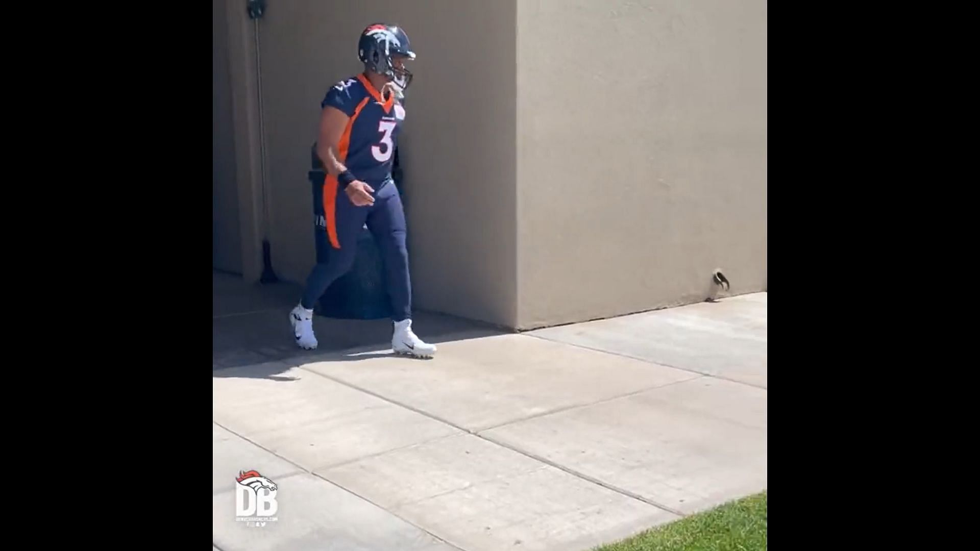 Wilson walking out in full Broncos gear