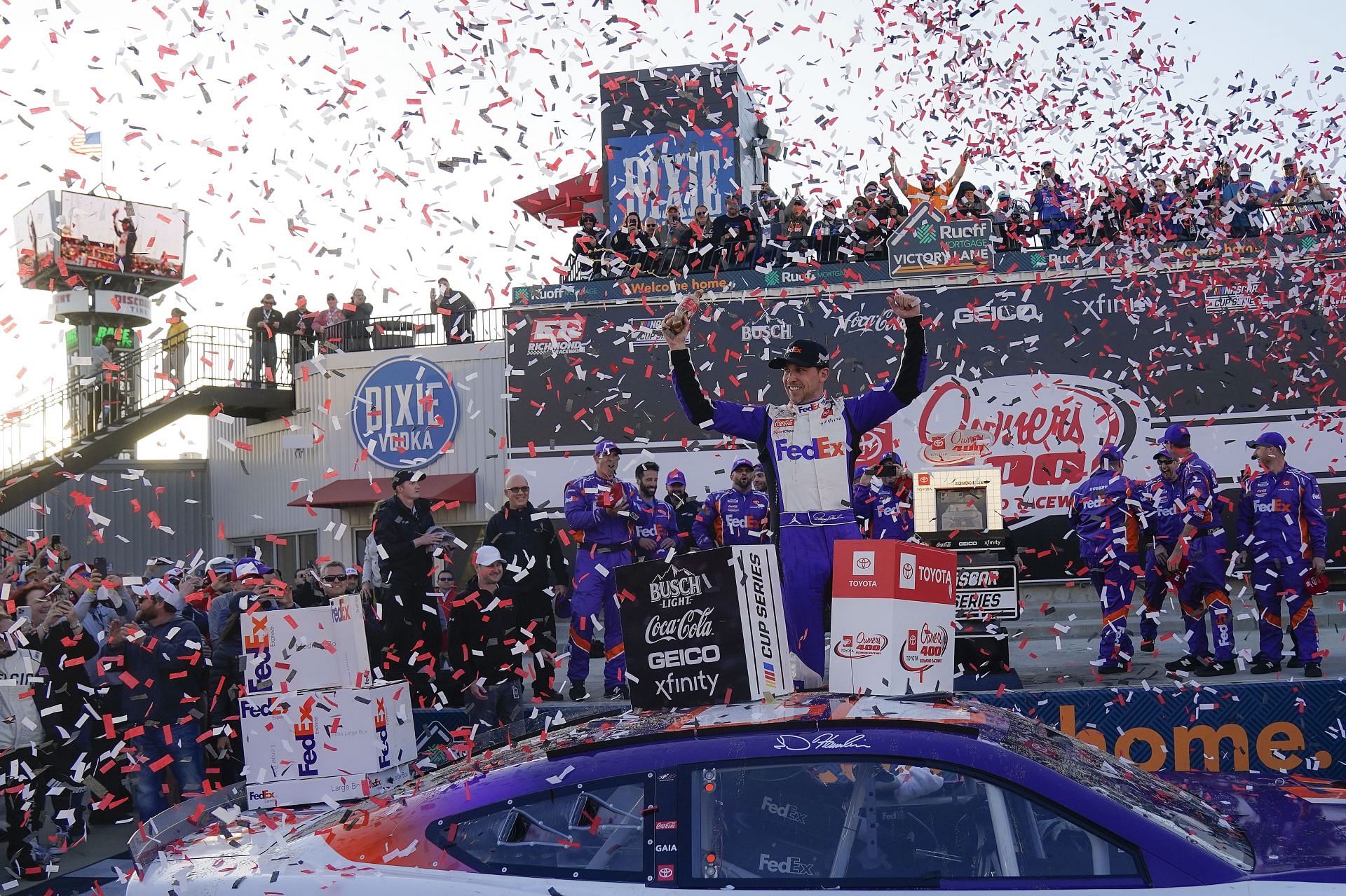 Denny Hamlin celebrates in the Ruoff Mortgage victory lane after winning the NASCAR Cup Series Toyota Owners 400 at Richmond Raceway (Photo by Jacob Kupferman/Getty Images)