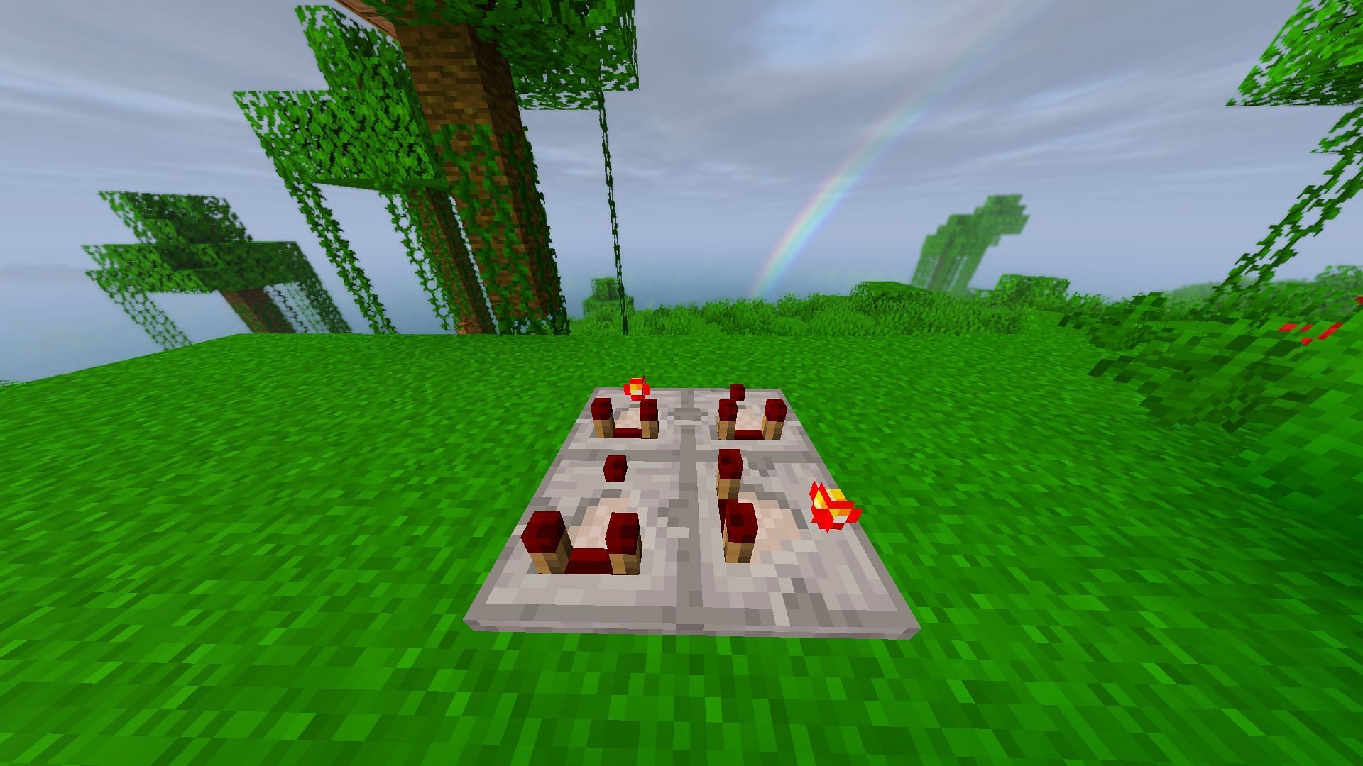 Four redstone comparators, with the frontal redstone torch turned on in two (Image via Minecraft)