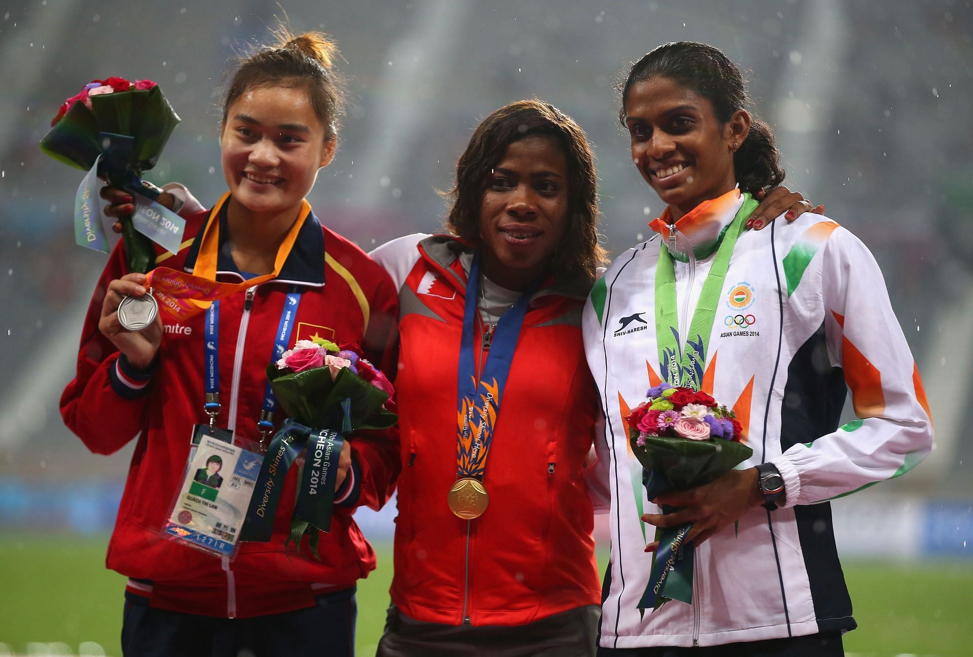 Bronze medalist Poovamma MR (extreme right) of India during the victory ceremony for the Women&#039;s 400m at the 2014 Asian Games in Incheon (Getty Images)