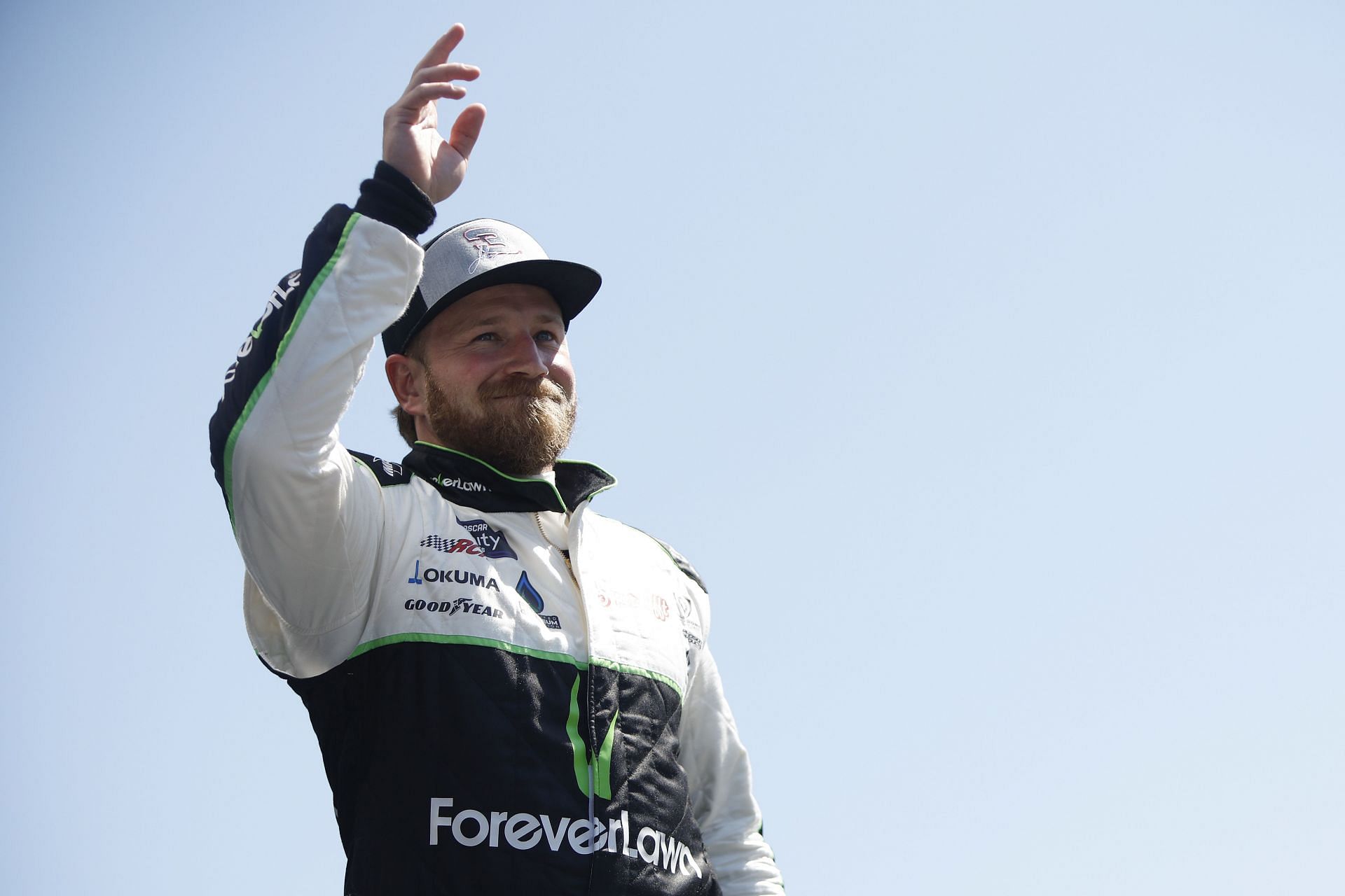 Jeffrey Earnhardt waves to fans during driver intros prior to the NASCAR Xfinity Series Ag-Pro 300 at Talladega Superspeedway. (Photo by Sean Gardner/Getty Images)