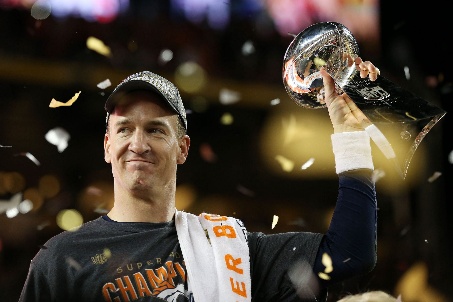 Peyton Manning lifting the Vince Lombardi trophy