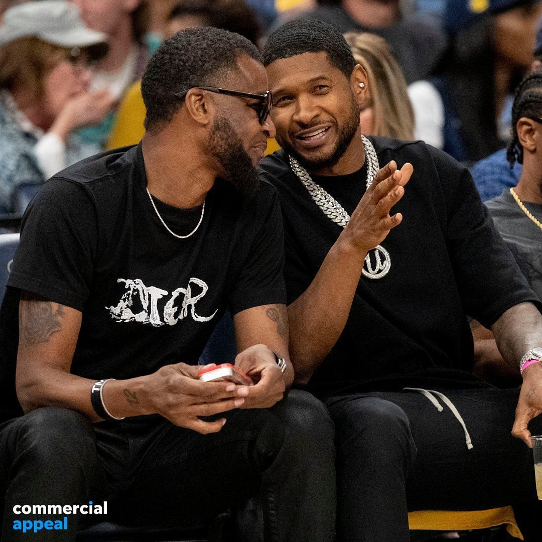 Usher sitting beside Tee Morant in Memphis Grizzlies vs. Minnesota Timberwolves Game 5 of the first round of the NBA playoffs. 