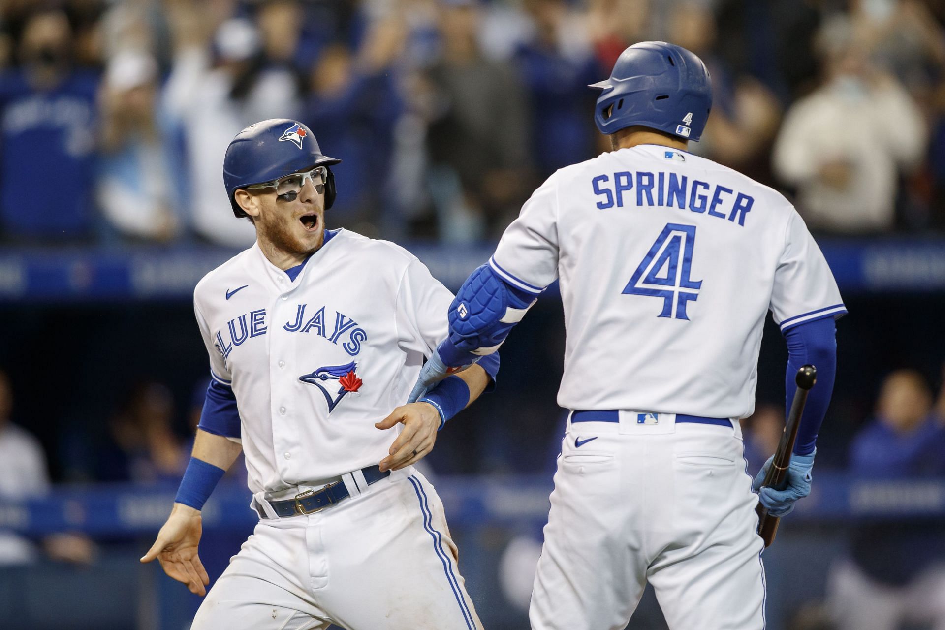 Danny Jansen (L) and George Springer (R)