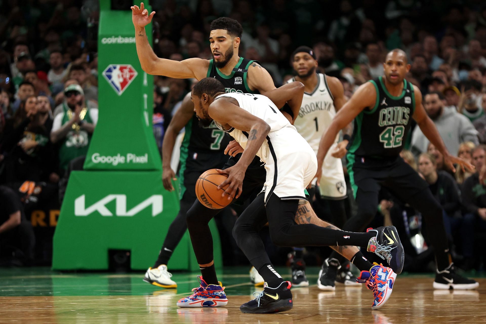 Kevin Durant and Jayson Tatum in action during Brooklyn Nets v Boston Celtics - Game One
