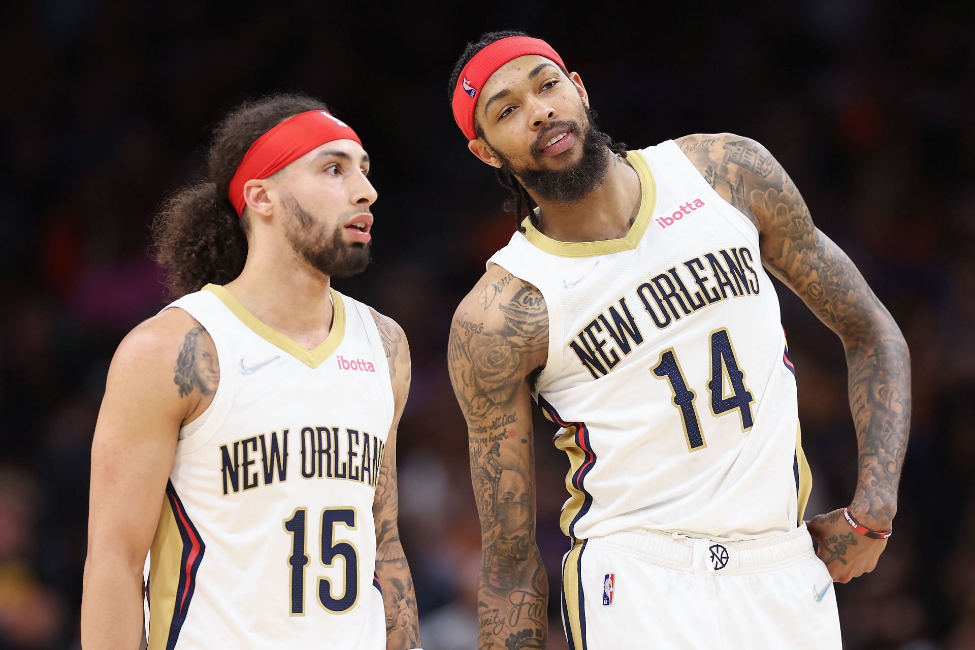 Jose Alvarado and Brandon Ingram of the New Orleans Pelicans