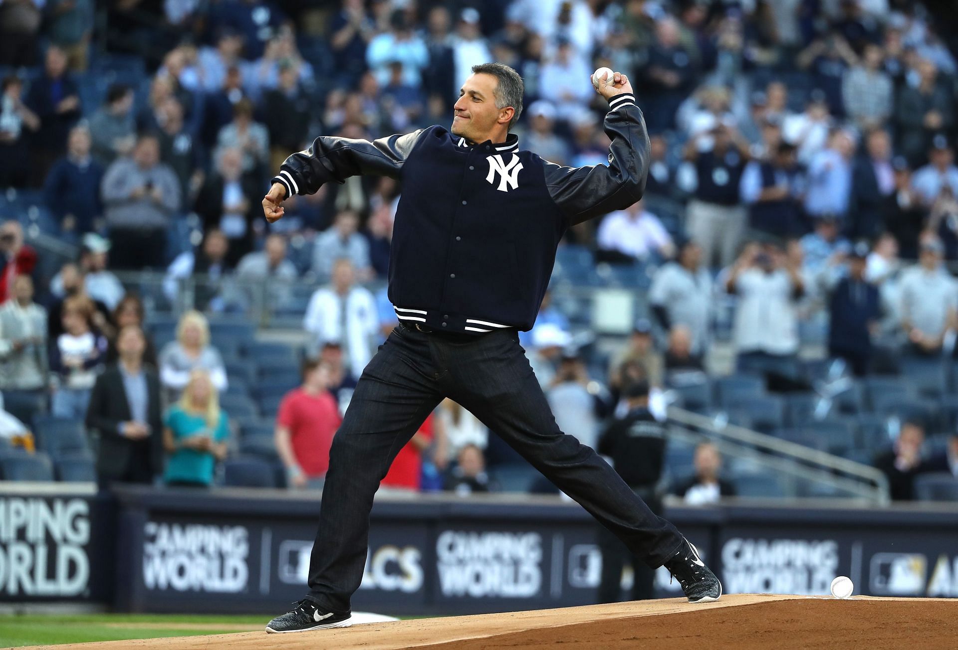 Andy Pettitte throws the first pitch