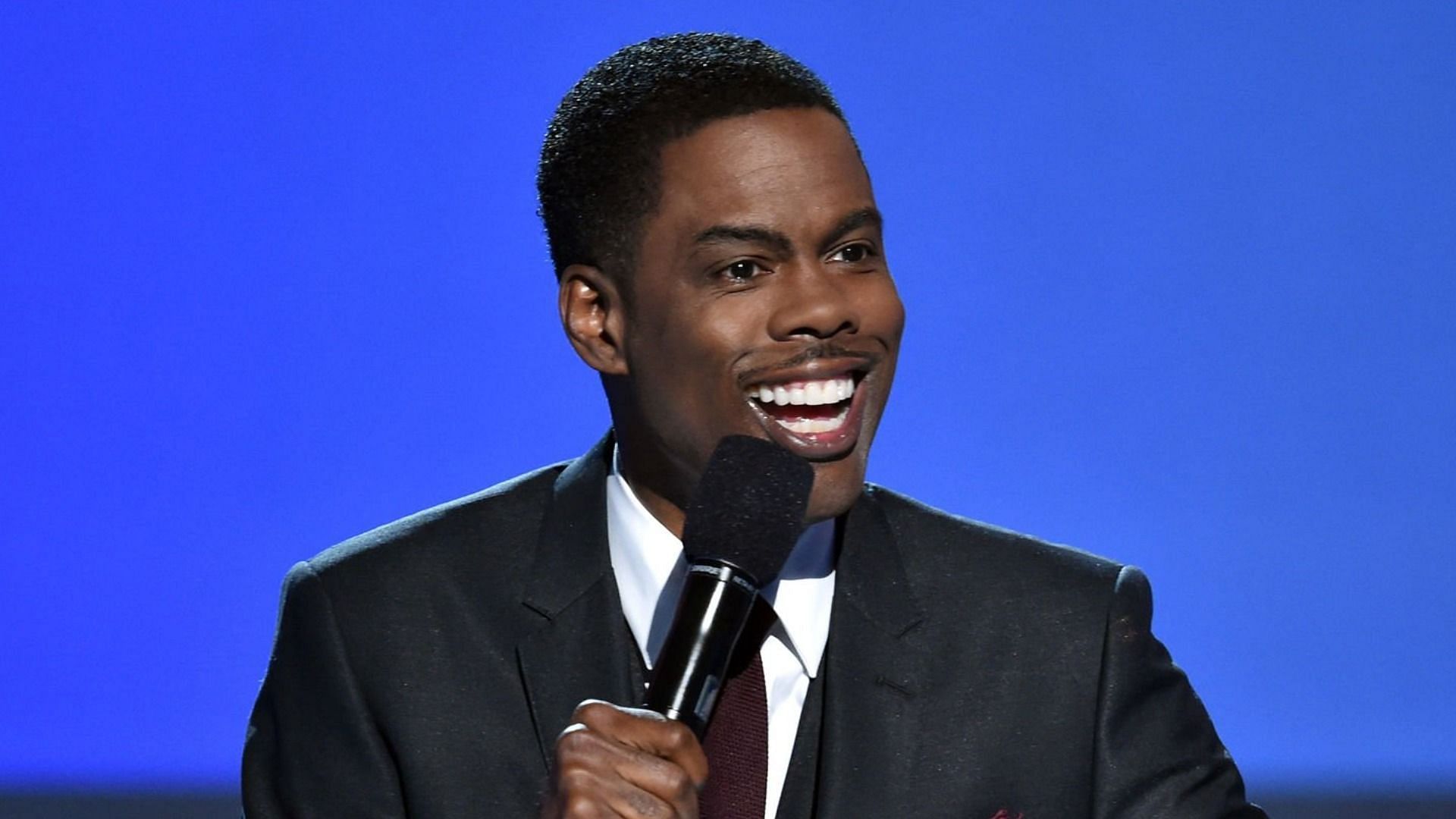 Chris Rock&#039;s learning disorder garnered renewed attention post-2022 Oscars (Image via Kevin Winter/Getty Images)