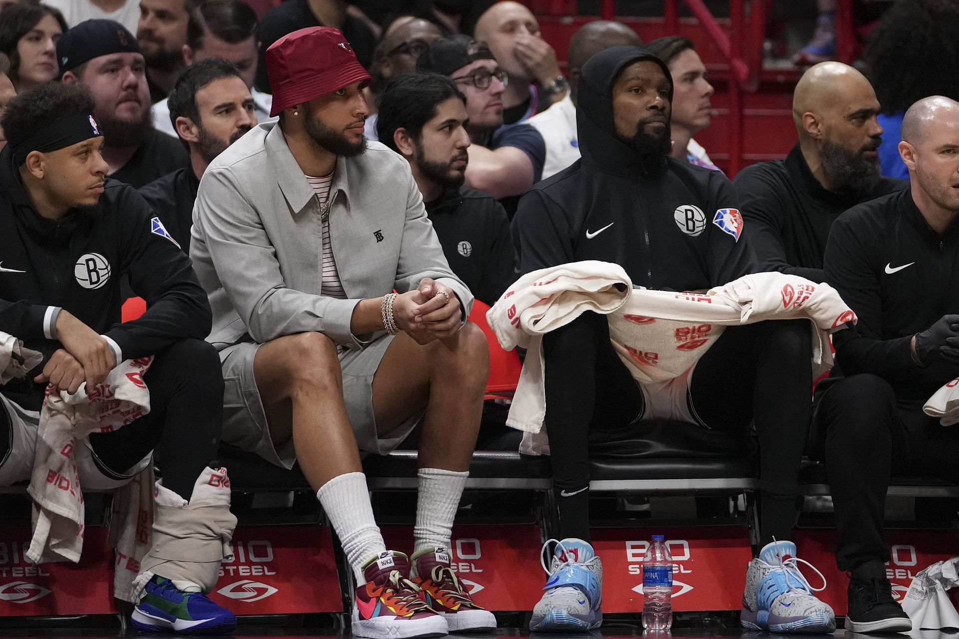 Ben Simmons and Kevin Durant of the Brooklyn Nets sit on the bench.