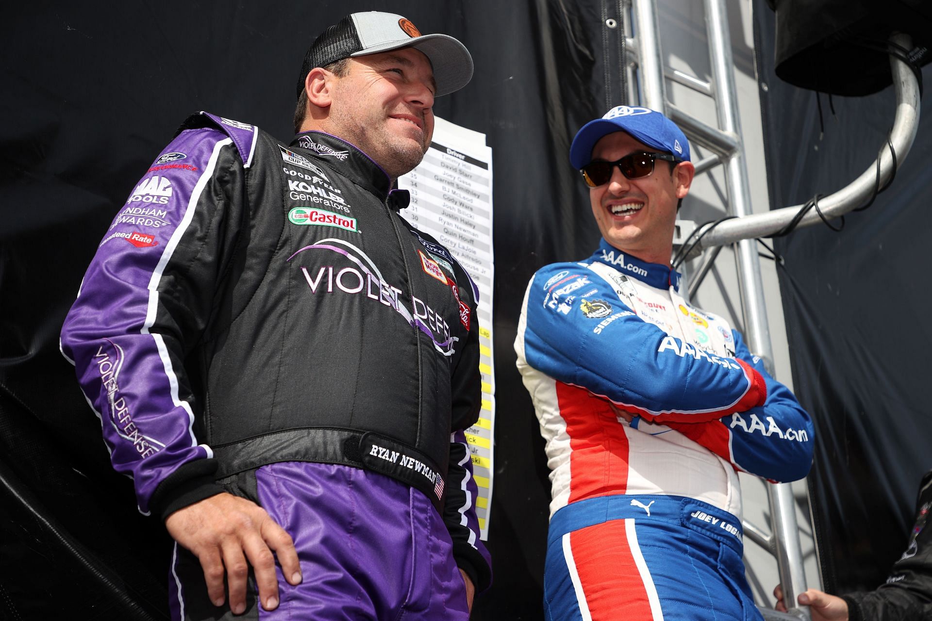 Ryan Newman (Left) and Joey Logano (Right) talk backstage during pre-race ceremonies prior to the NASCAR Cup Series Autotrader EchoPark Automotive 500 at Texas Motor Speedway.