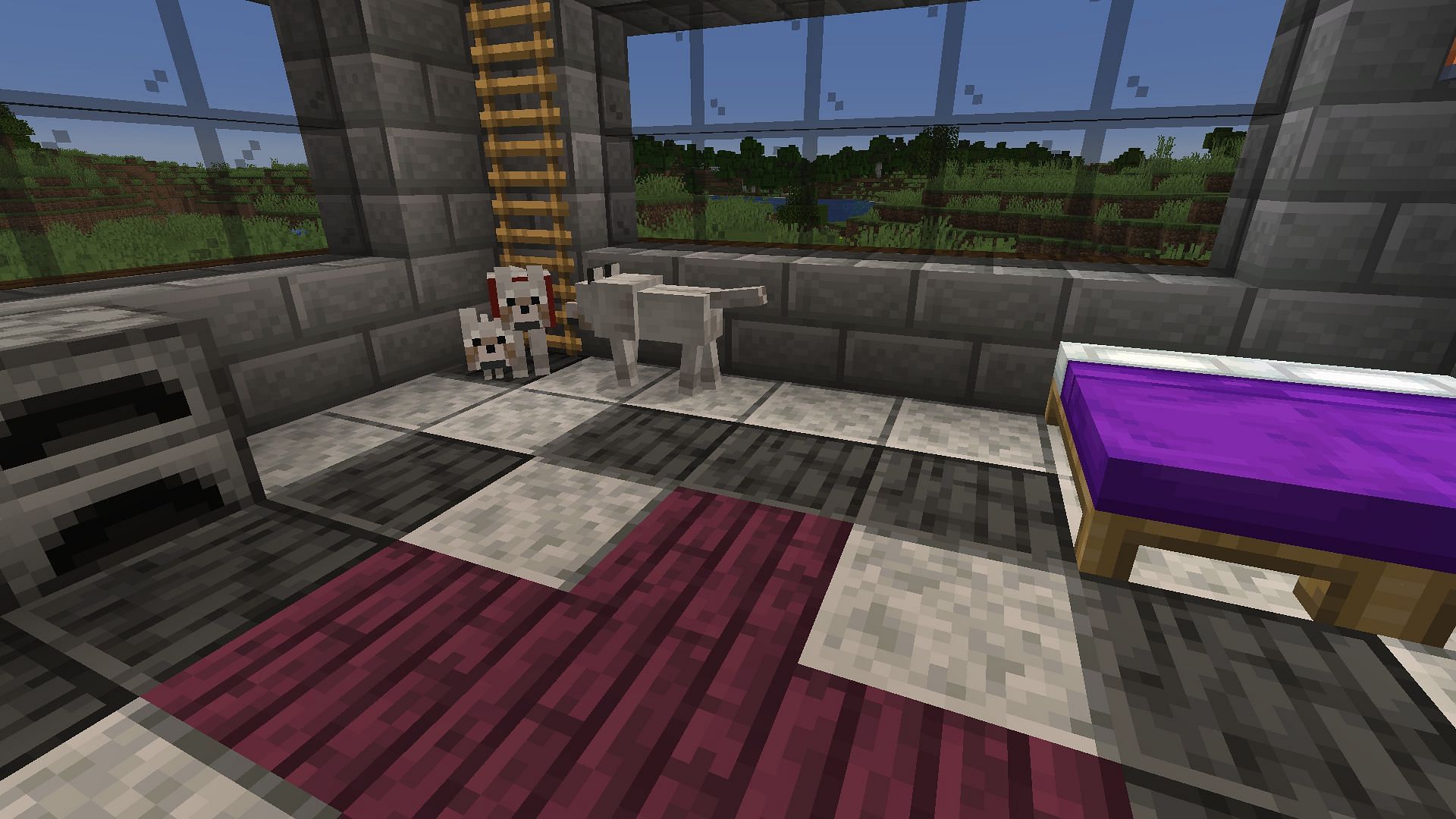 Two tamed wolves and a puppy in a base (Image via Minecraft)