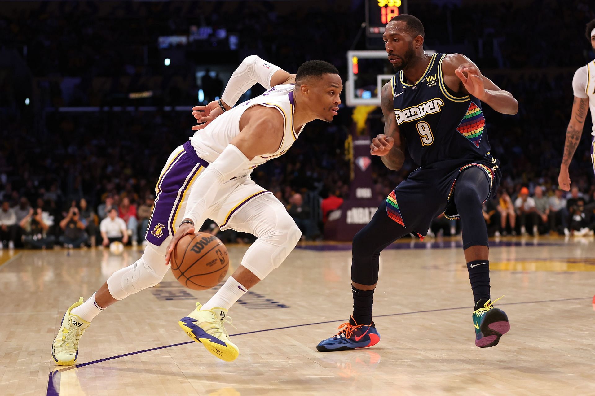 Russell Westbrook of the Lakers against Davon Reed of the Denver Nuggets