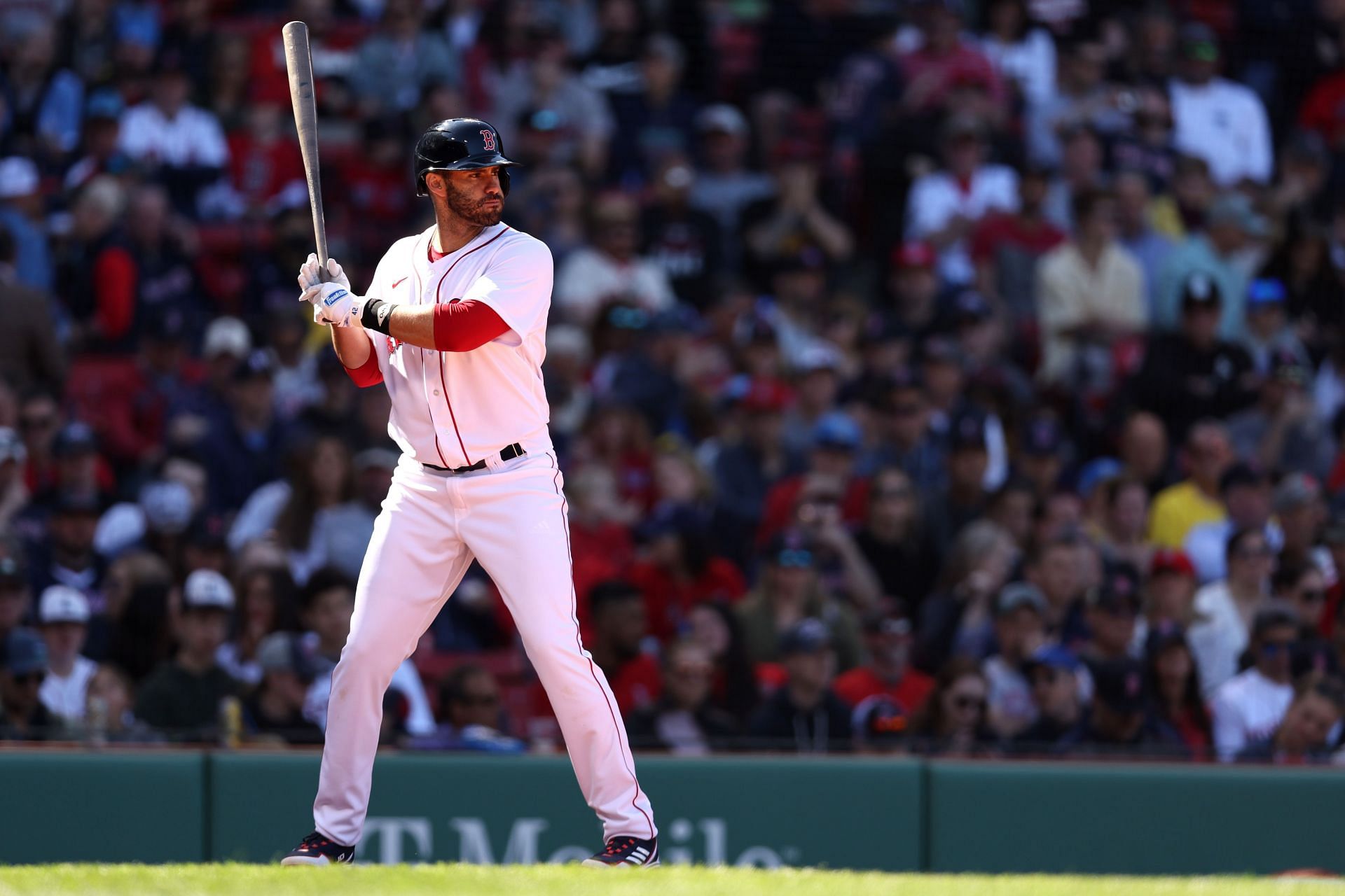 J.D. Martinez bats during the Red Sox home opener. 